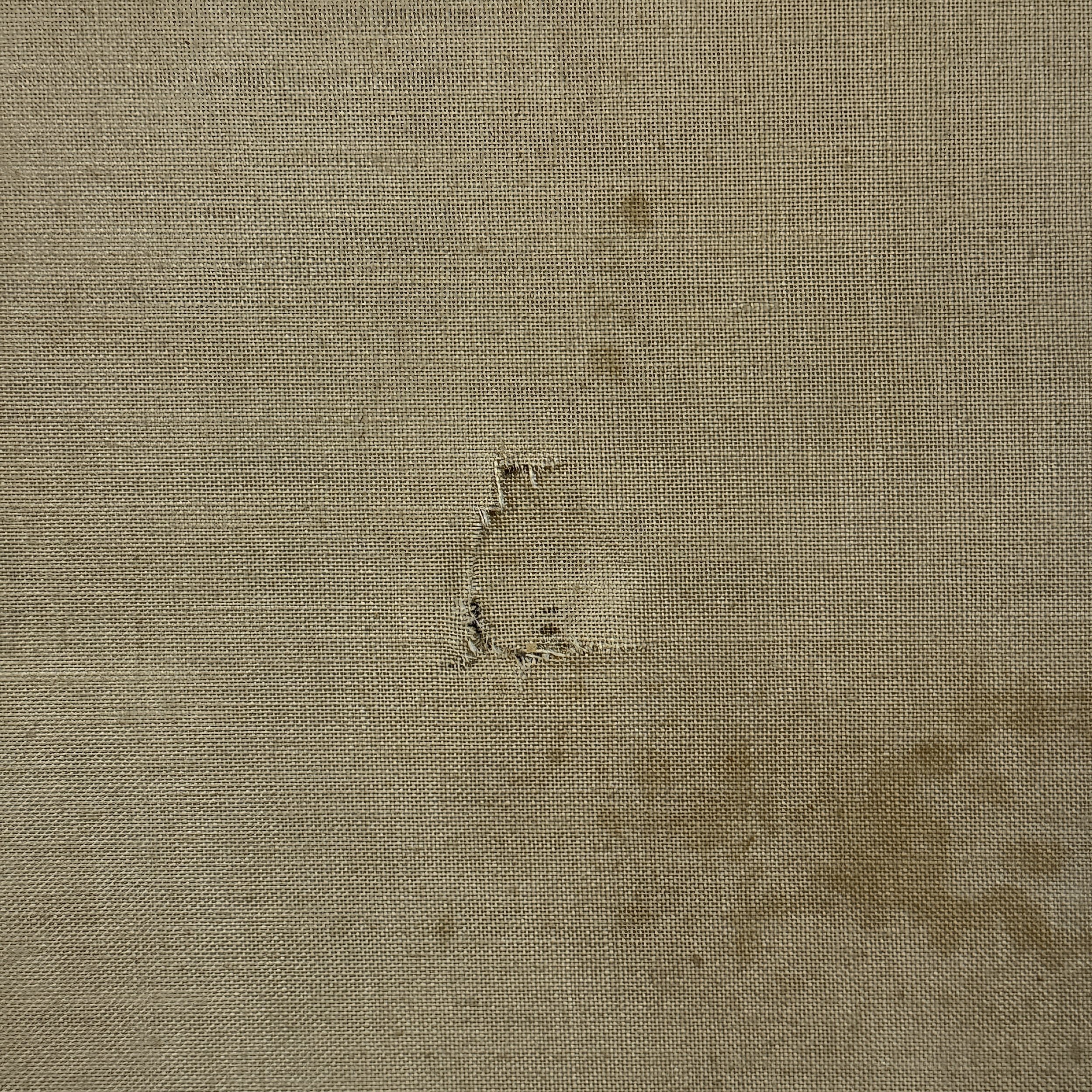 Verso view of the painting revealing the tear visible from the back of the canvas