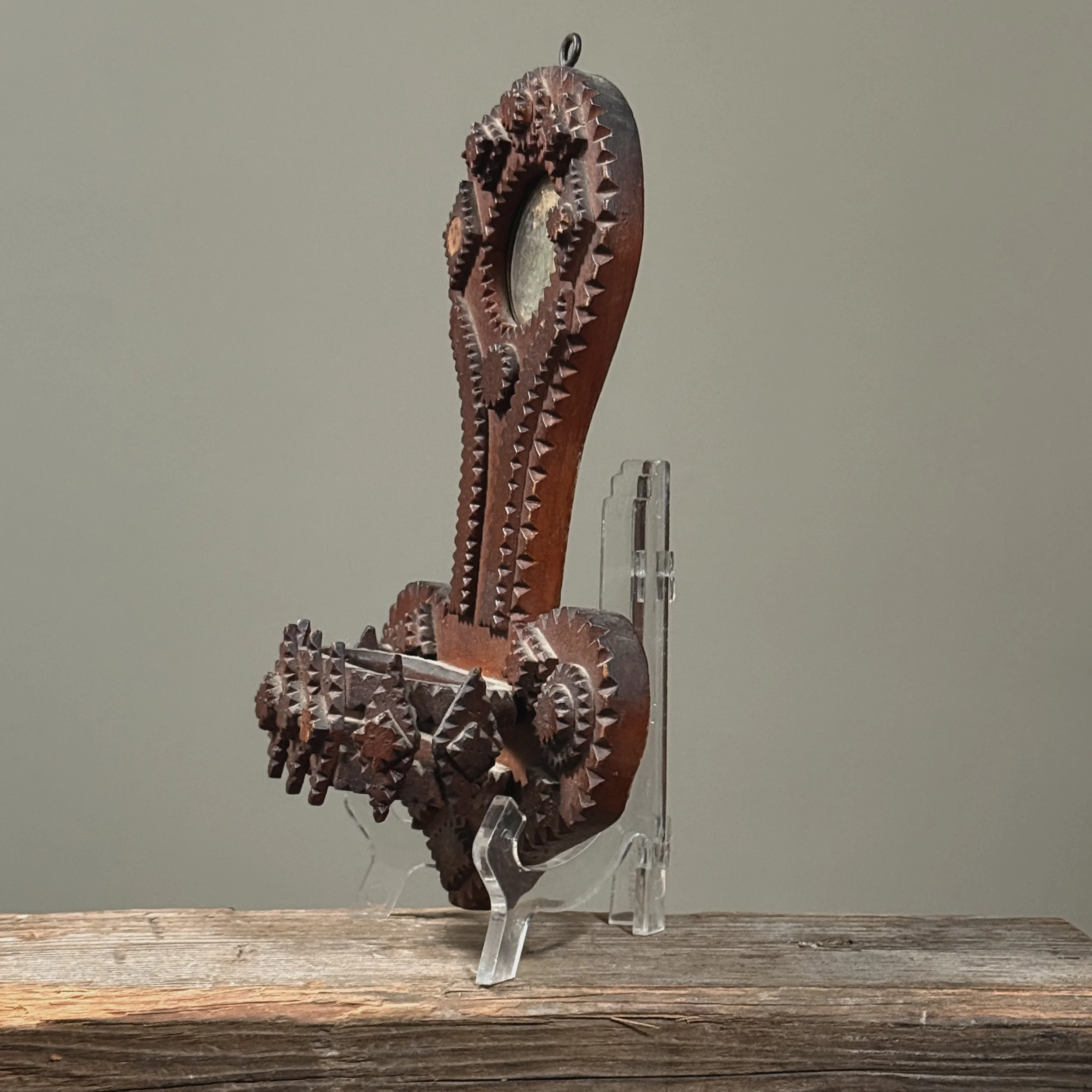 Side angle of carved Tramp Art wall pocket