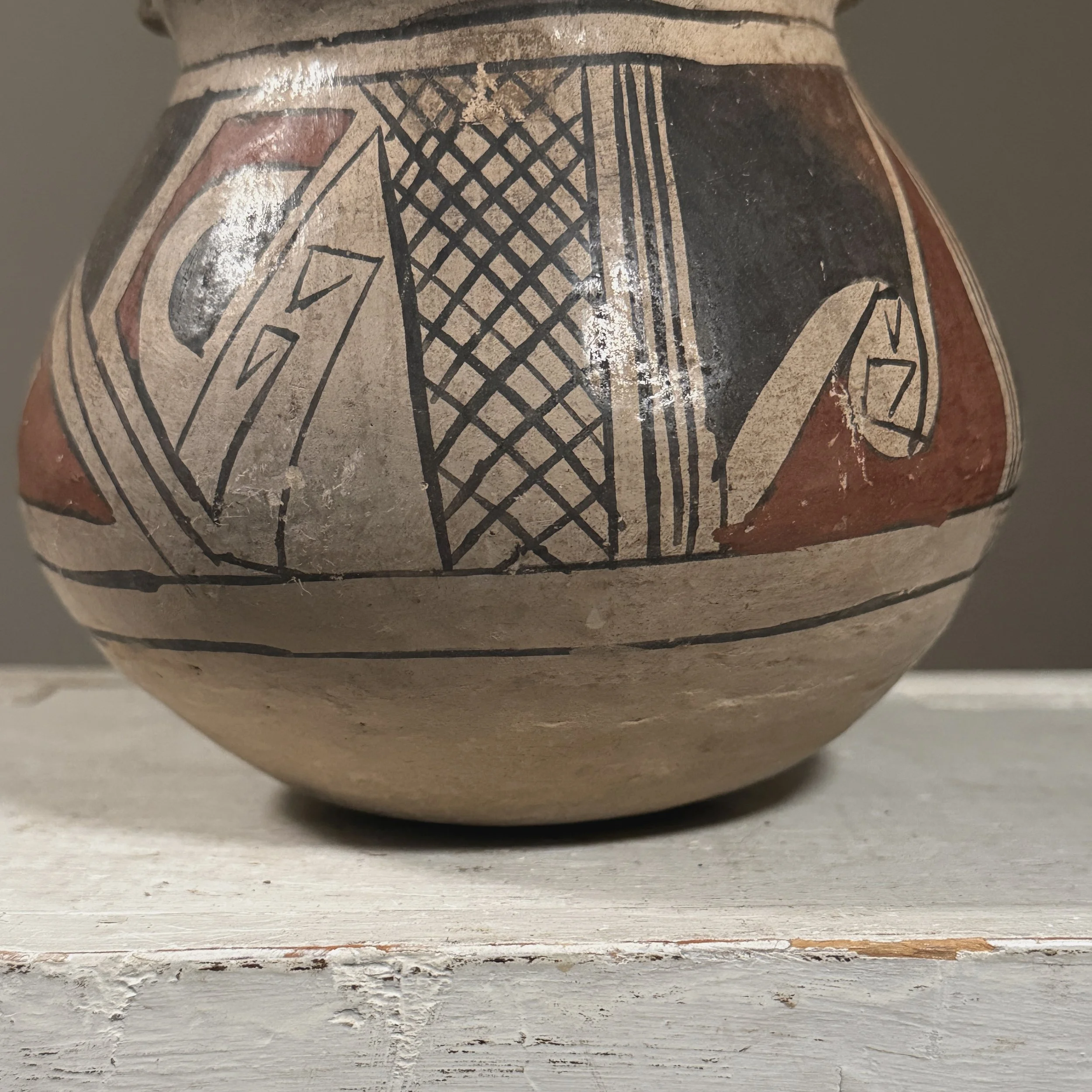 Surface wear on antique clay vessel