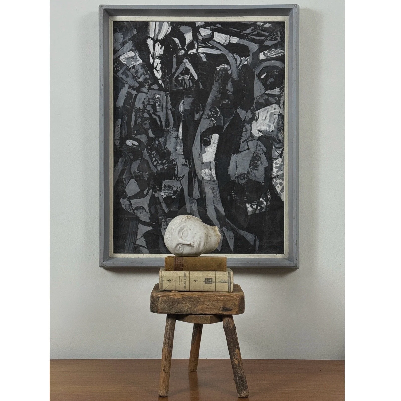 The artwork displayed in an interior vignette.
