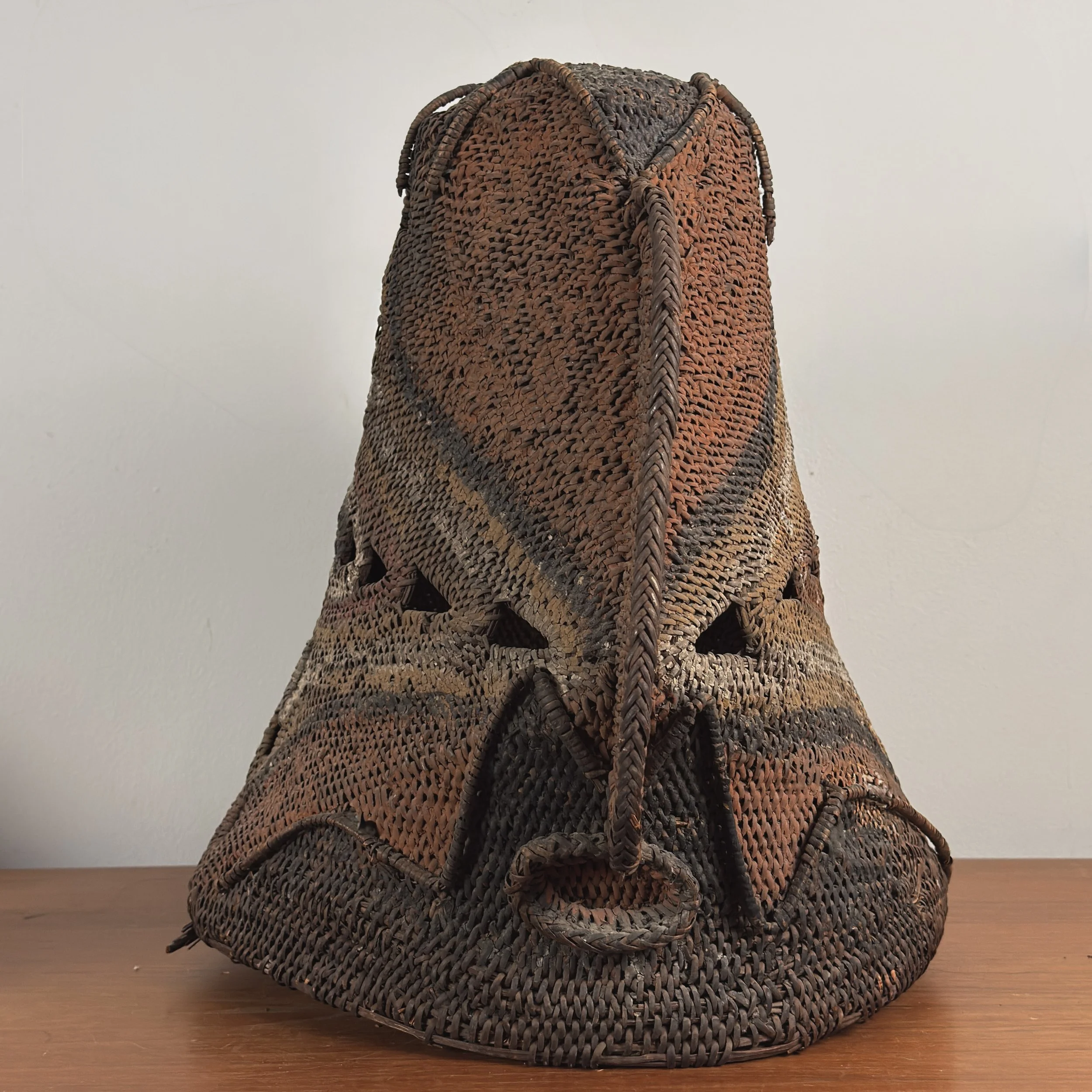 Monumental antique Abelam Baba Tagwa yam helmet mask full view woven cane fiber pigments