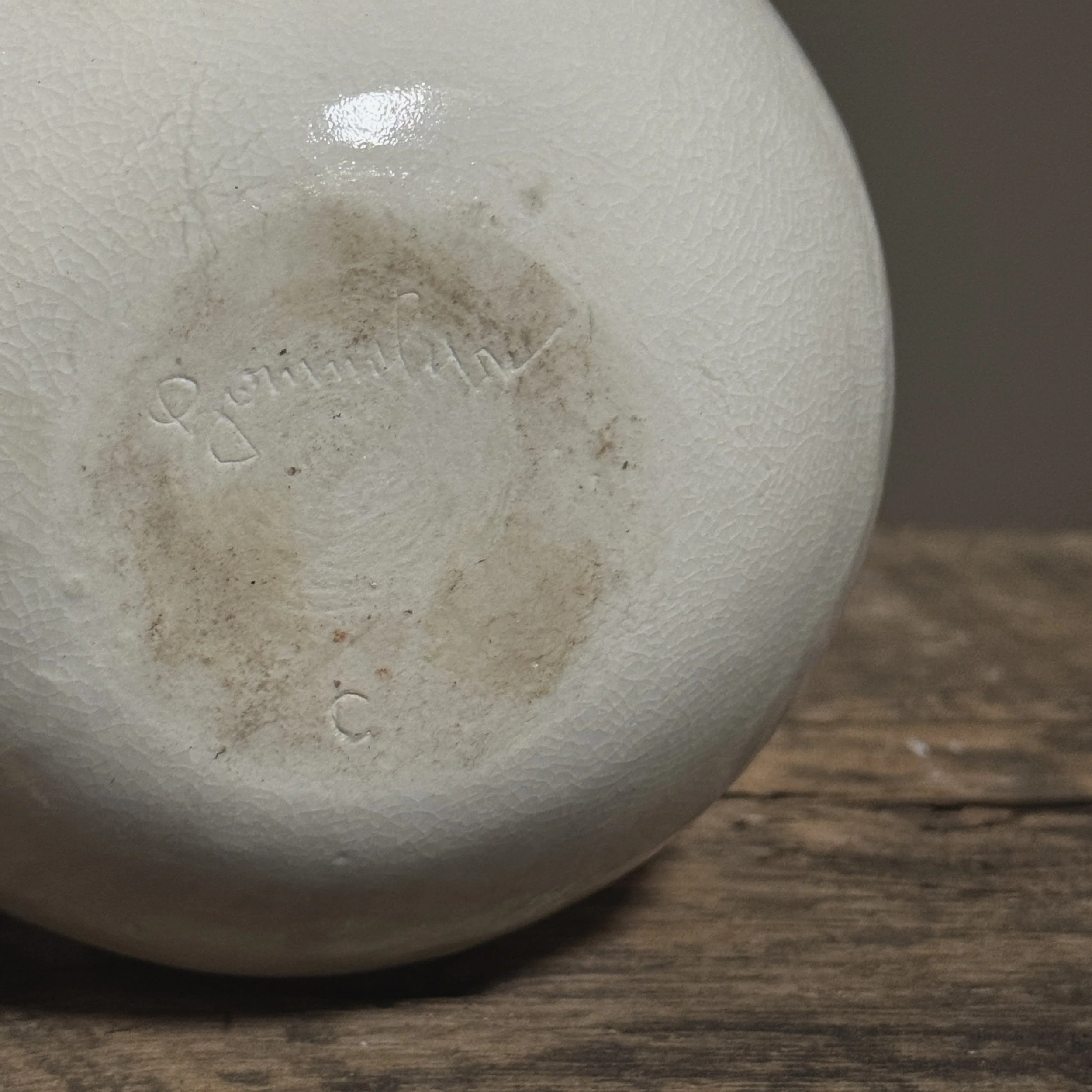 Artist-signed porcelain vessel with biomorphic accents