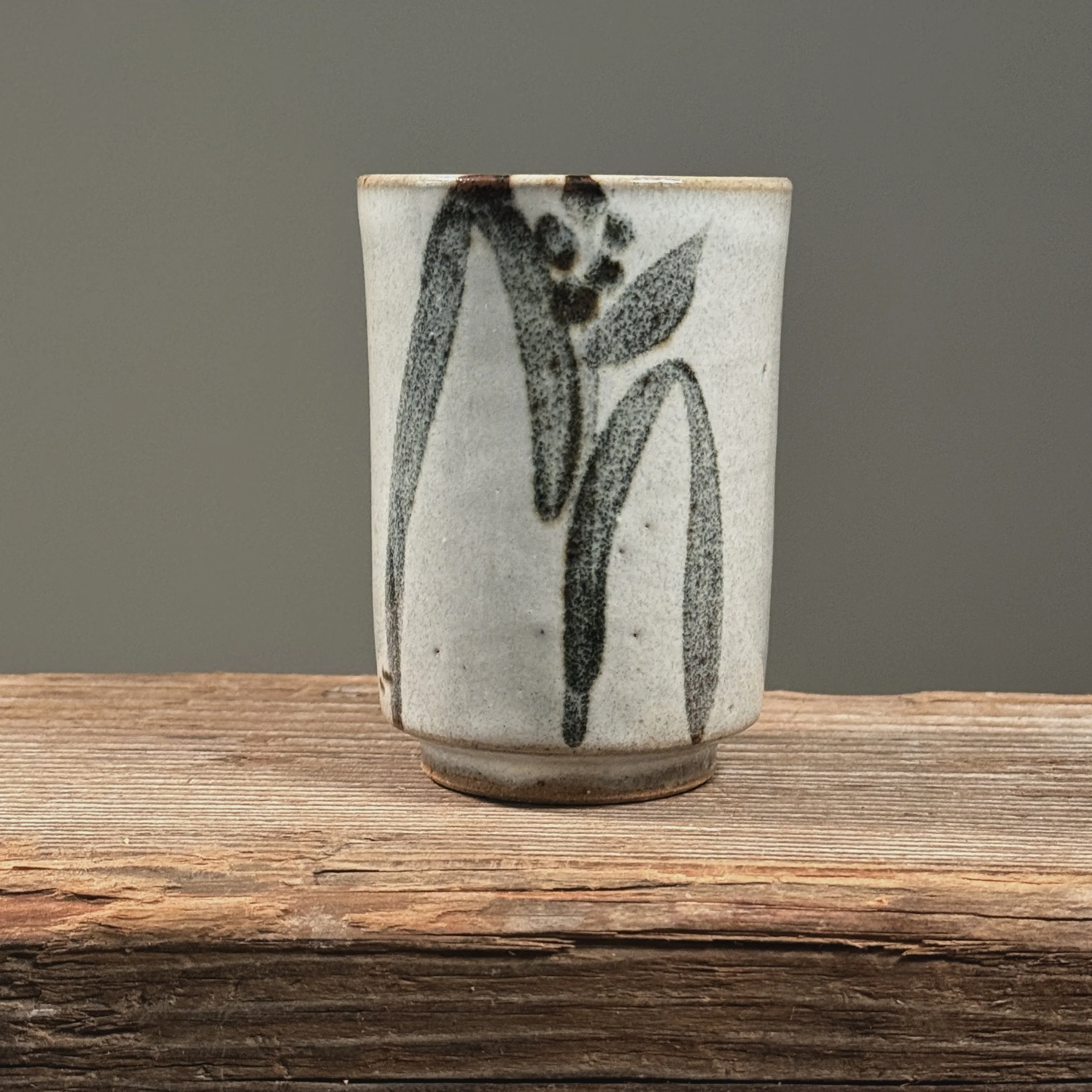 Front view of white cup.