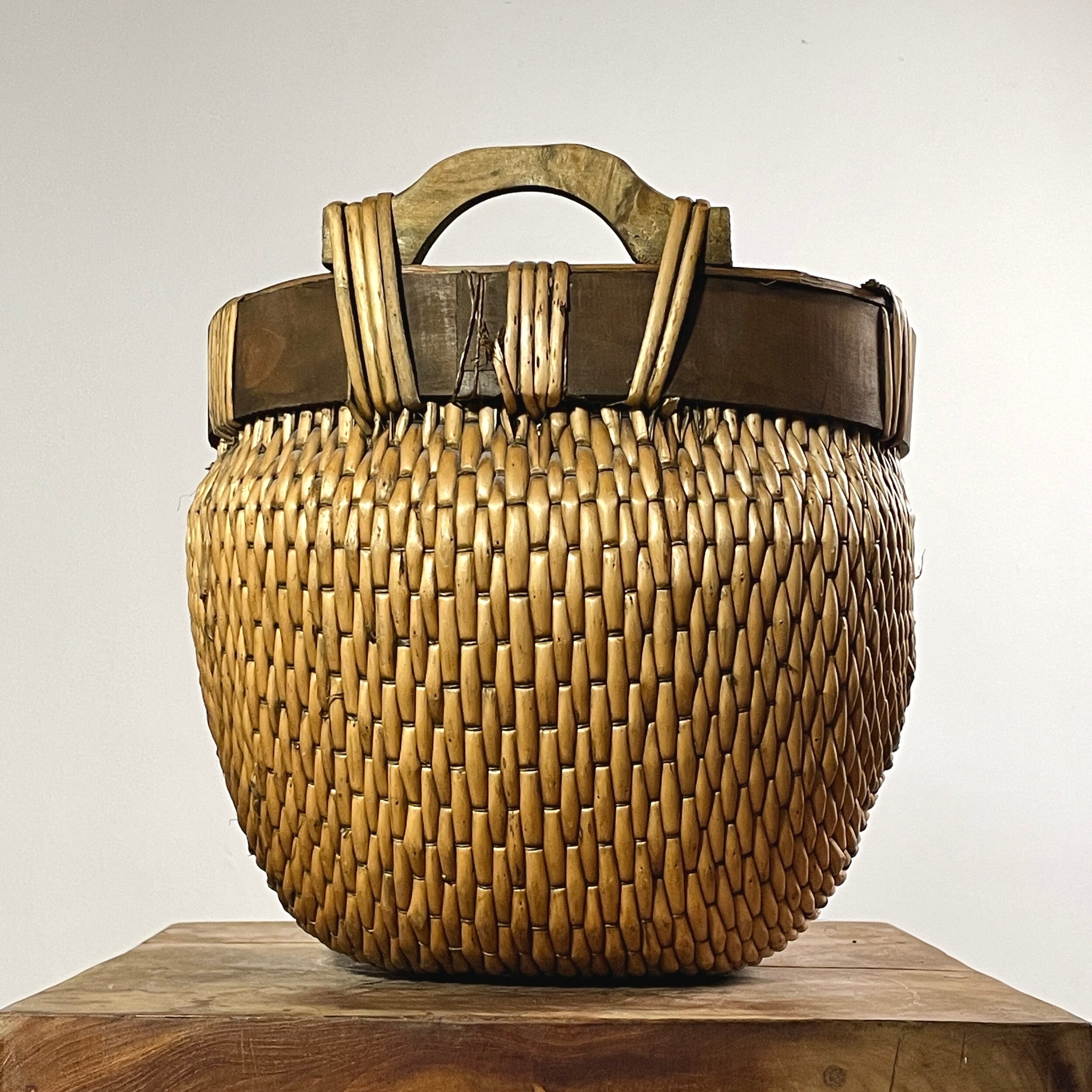 Vintage African Woven Reed Basket with Hand Carved Wood Handles