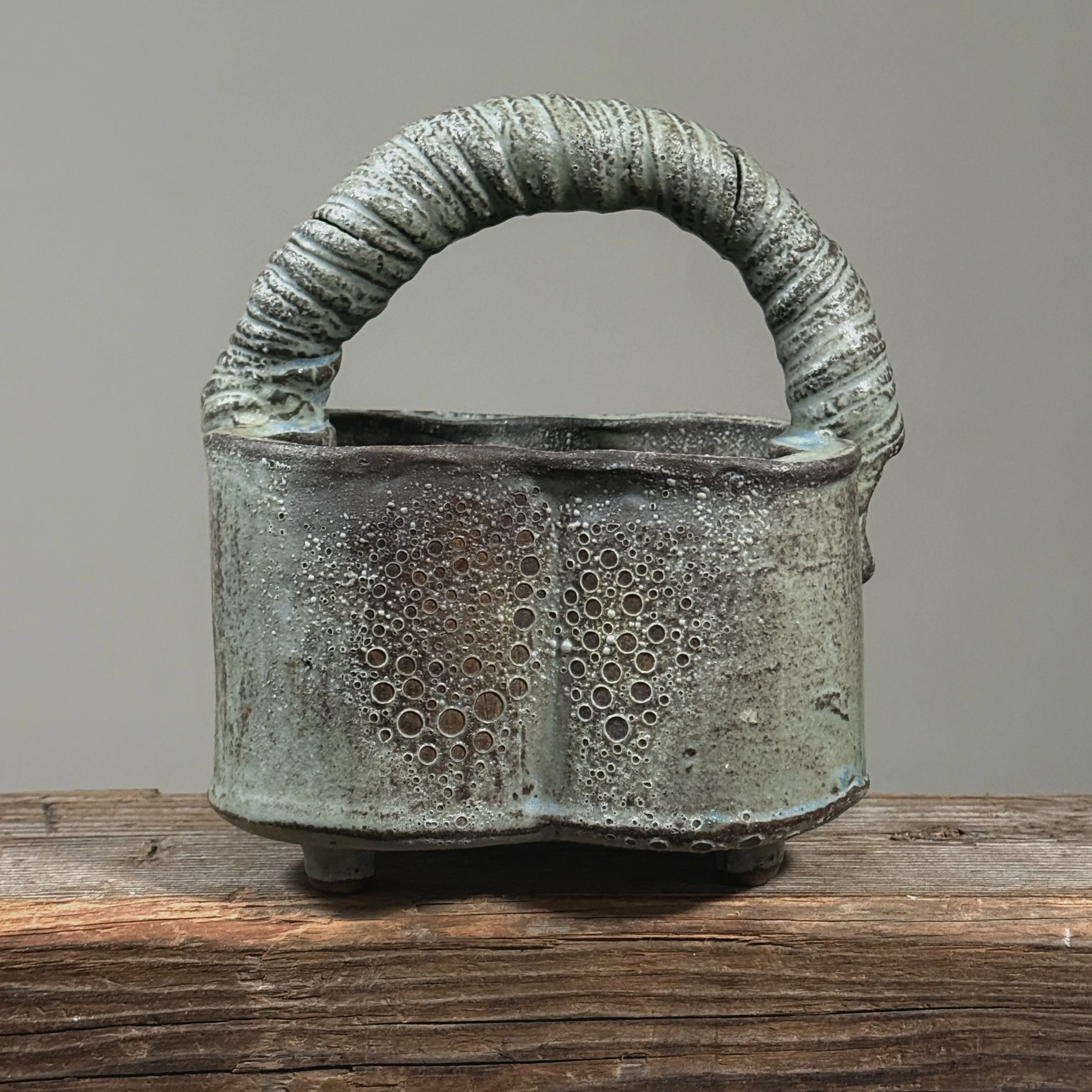 Seiko Kato Behr greenish-blue glazed stoneware vessel with hand-coiled handle