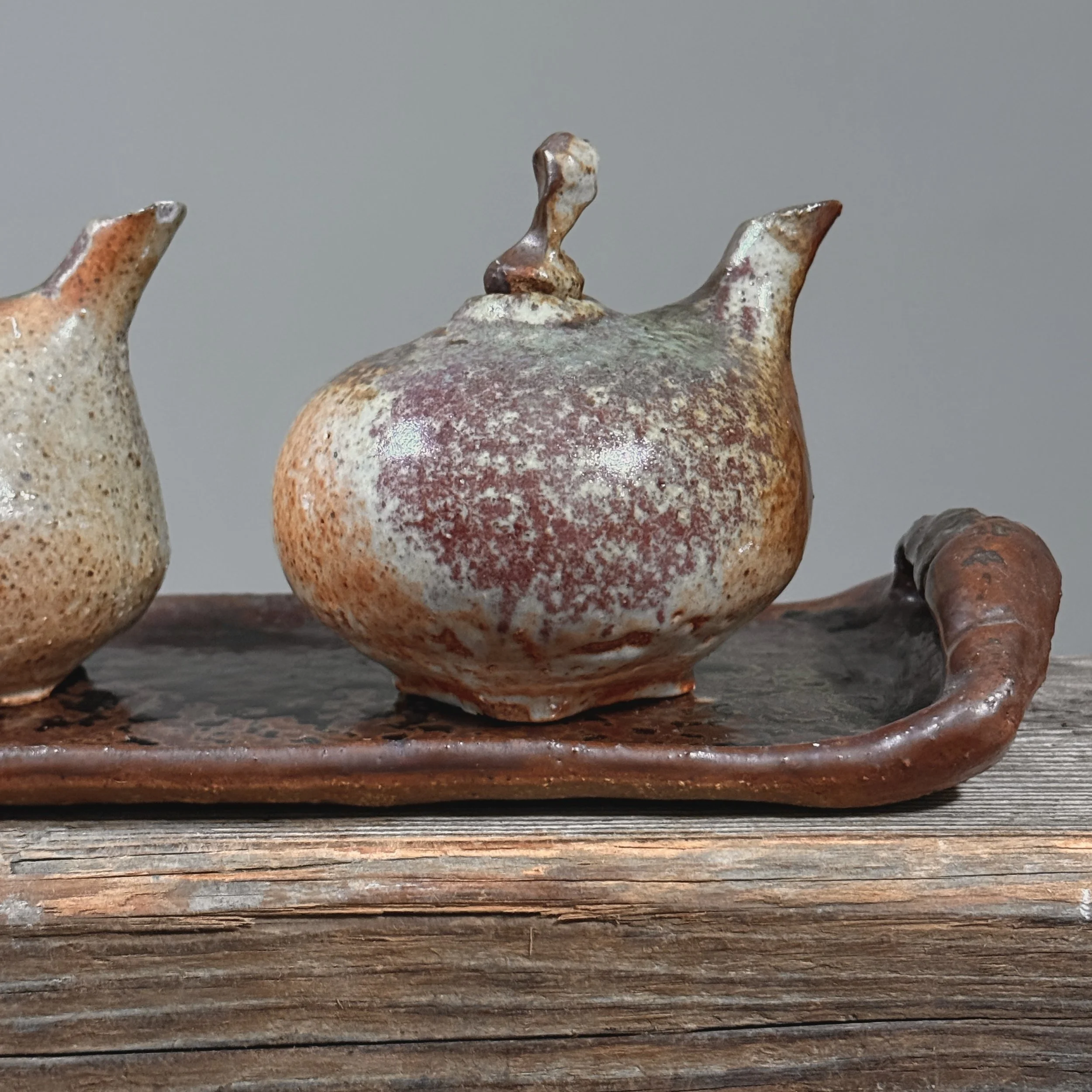 Vintage Postmodernist studio art metallic glazed vessel set with tray, signed