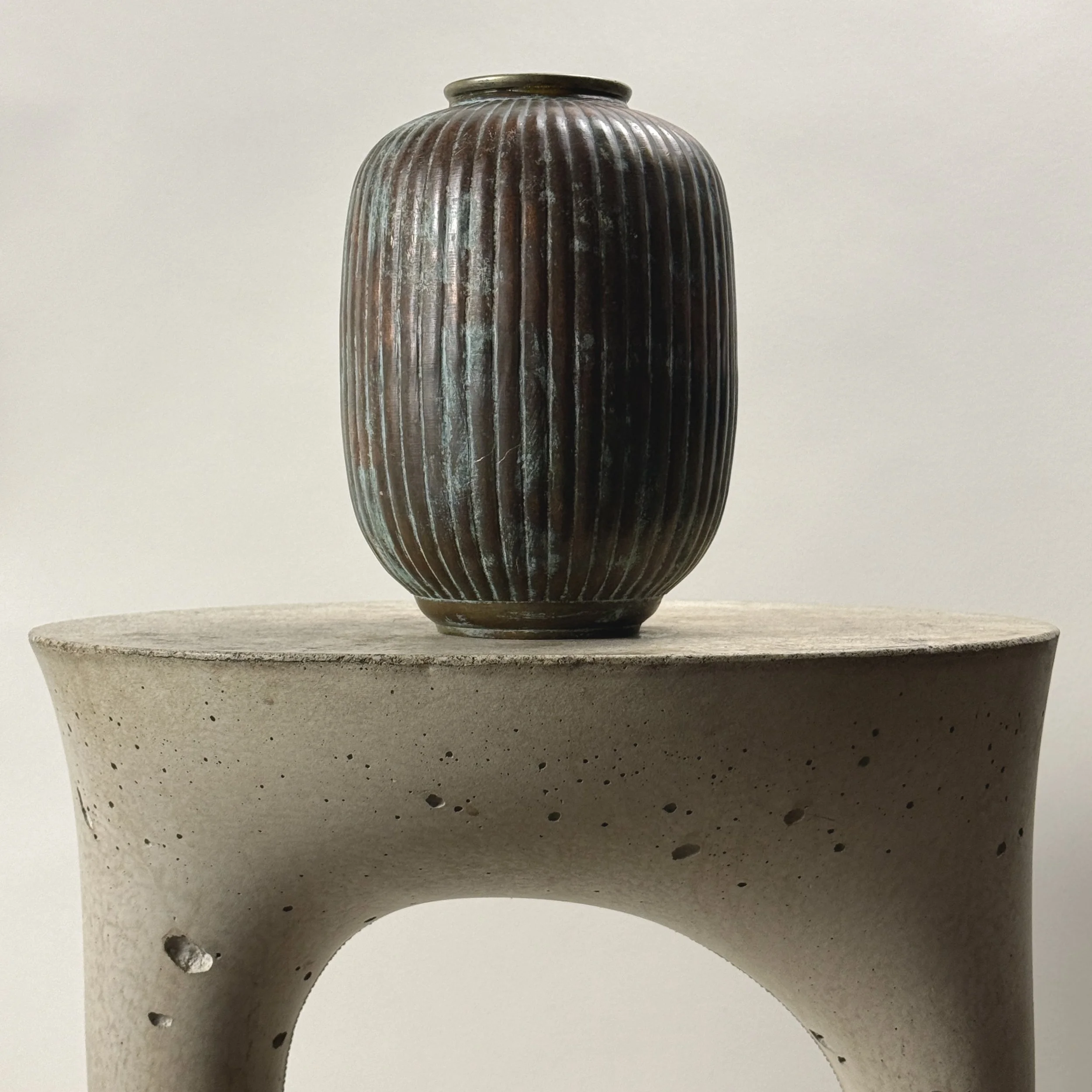 Full front view of antique Art Deco patinated brass ribbed vase, metal, verdegris patination over greyish-brown surface