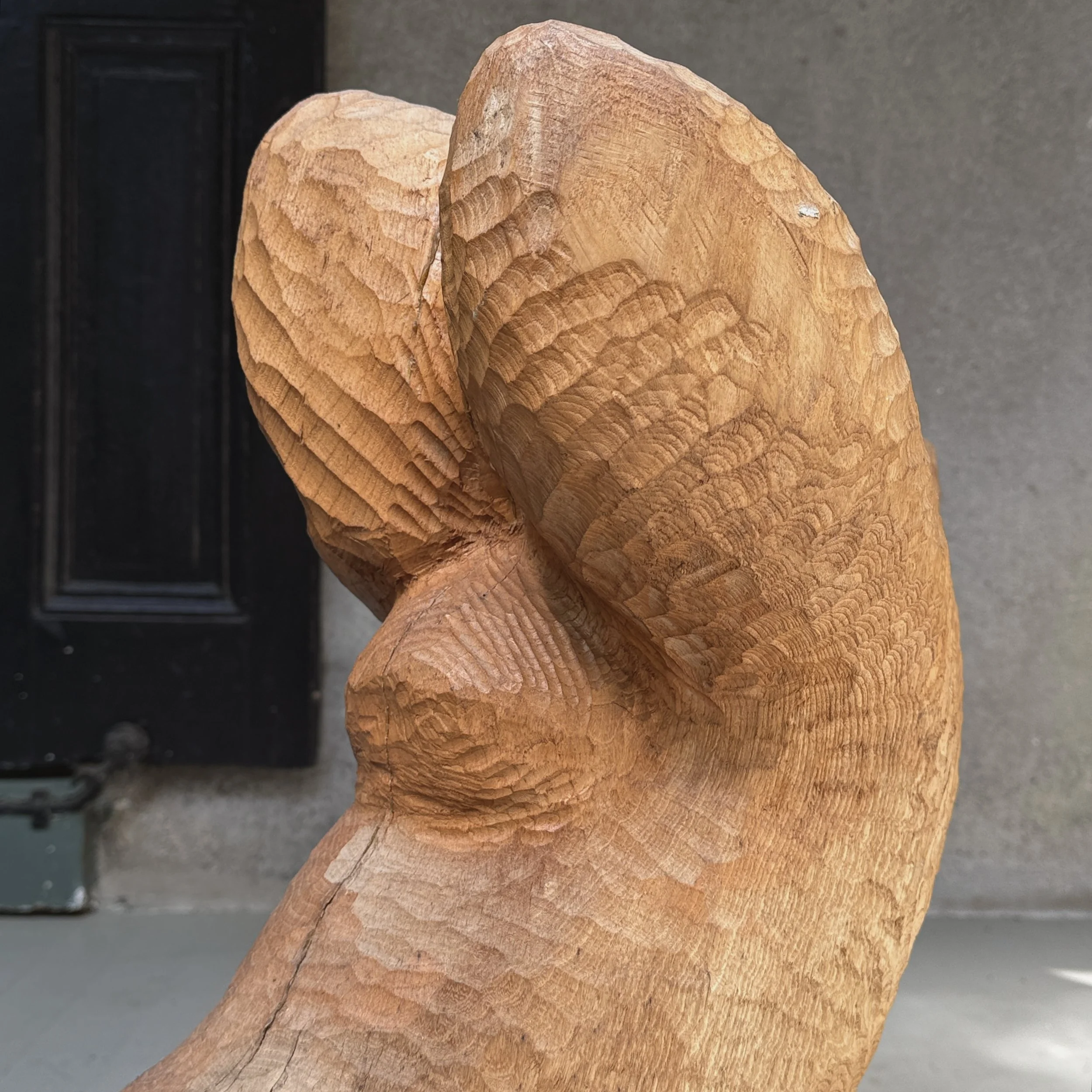 Macro detail of chip carved surface texture and wood grain
