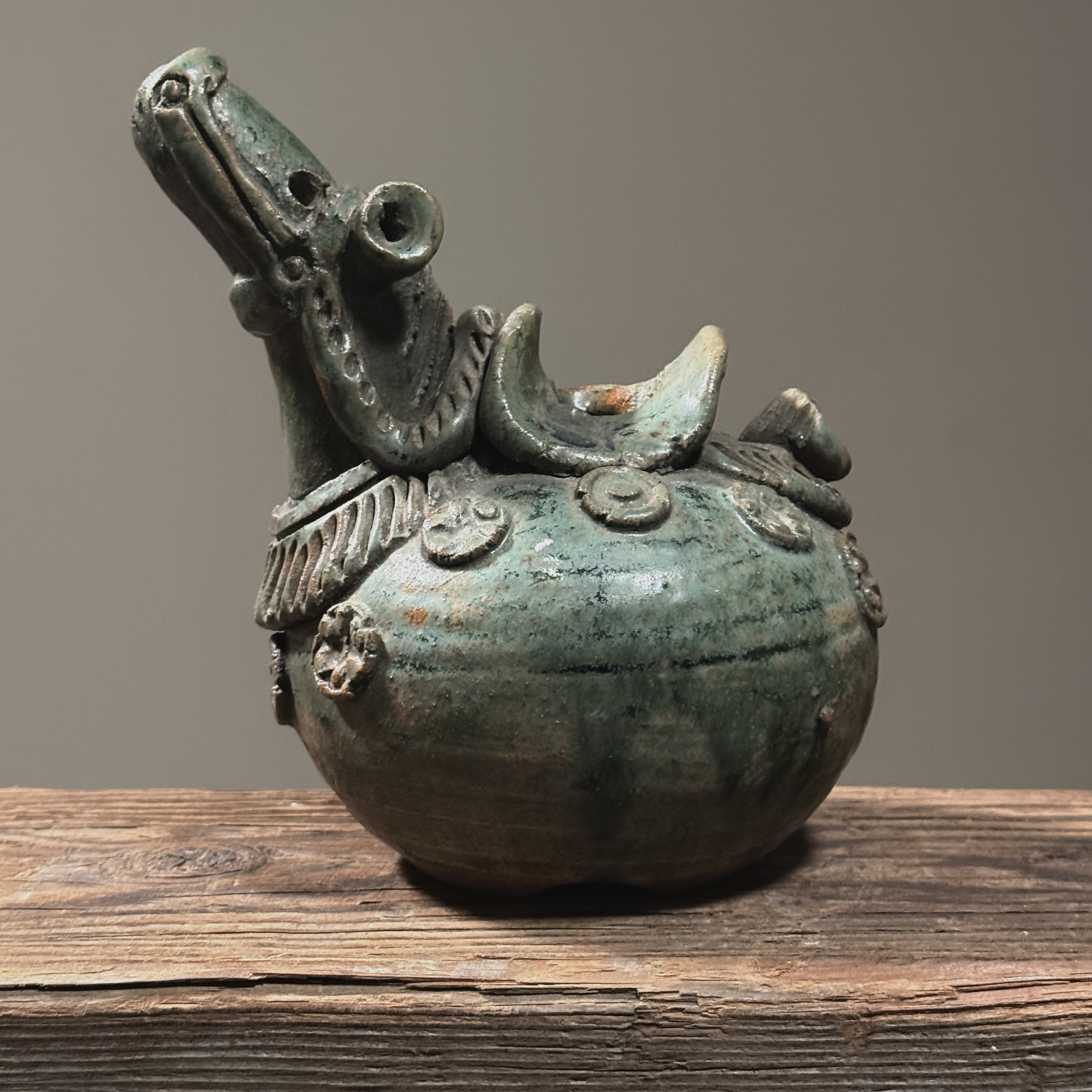 Antique Zuni style Chinese glazed ceramic war horse vessel. 6.75 inches height by 7.5 inches width by 5.25 inches depth.
