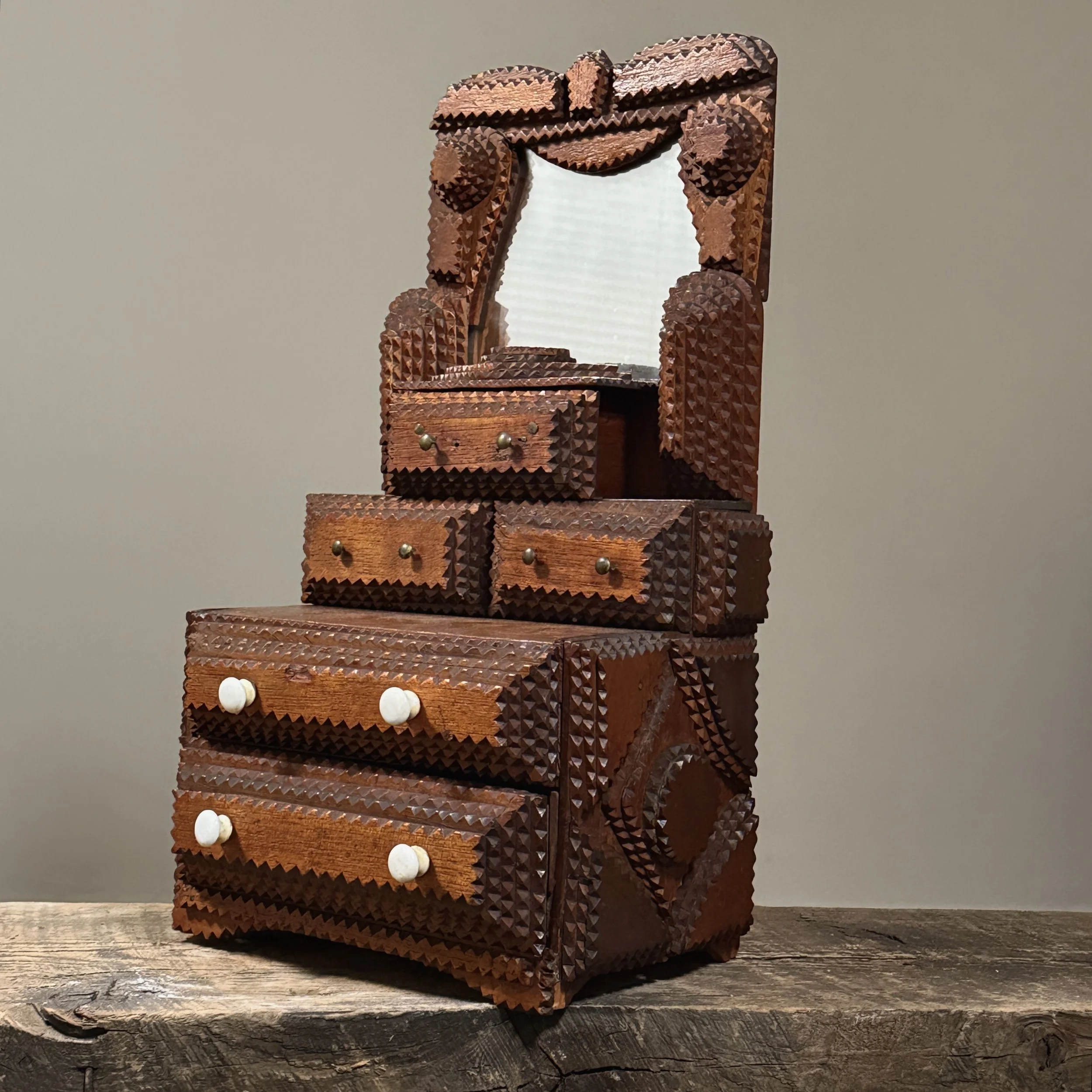 Side view showing the piece's depth and construction.