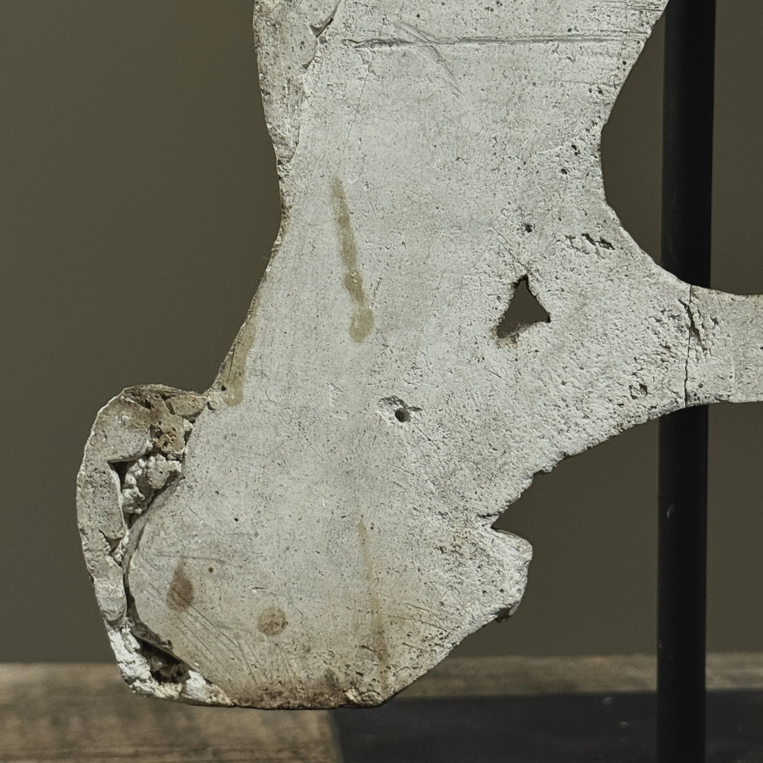 Close-up of plaster detailing and worn edges