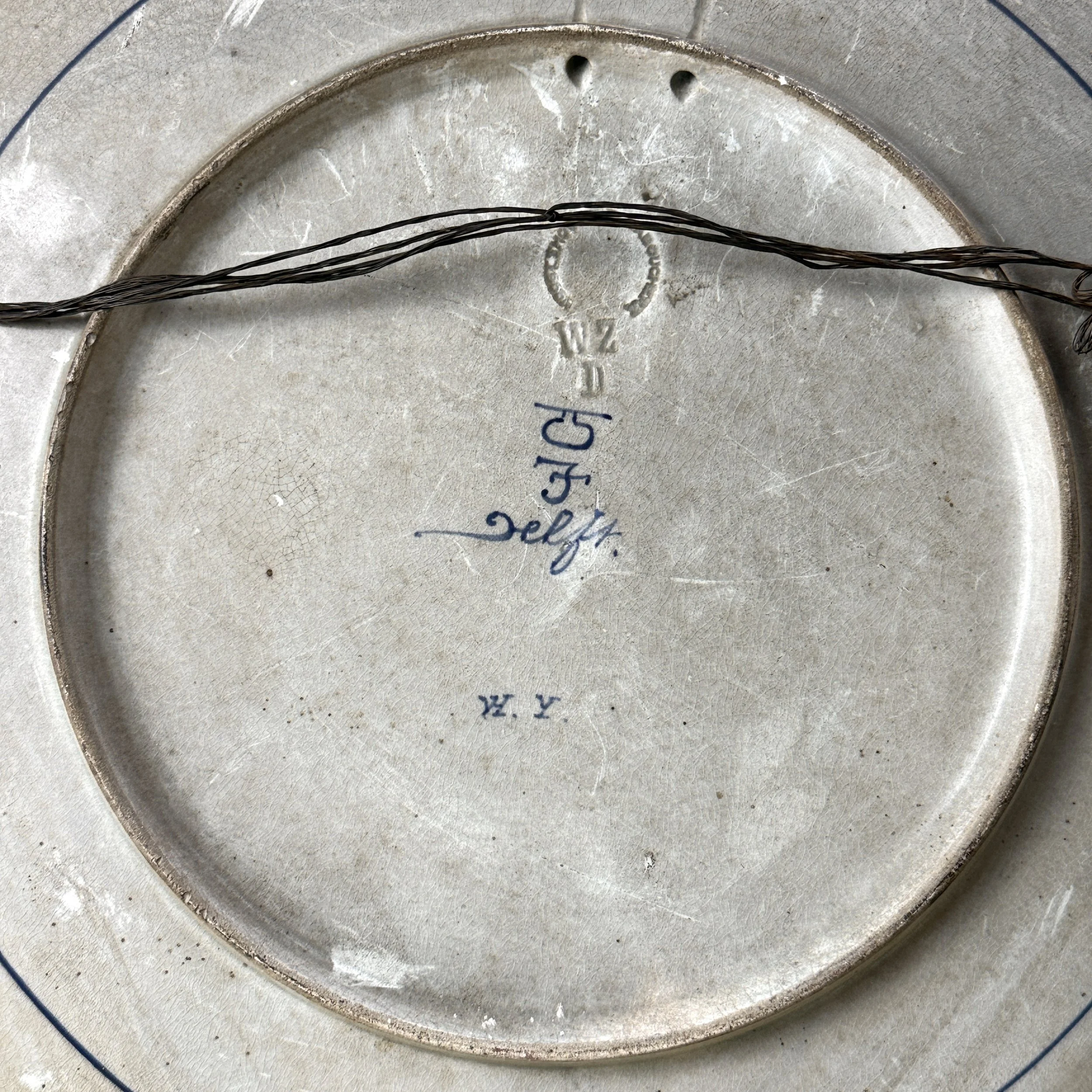 Verso of charger. Joost Thooft & Labouchere stamp visible. Signed and dated.