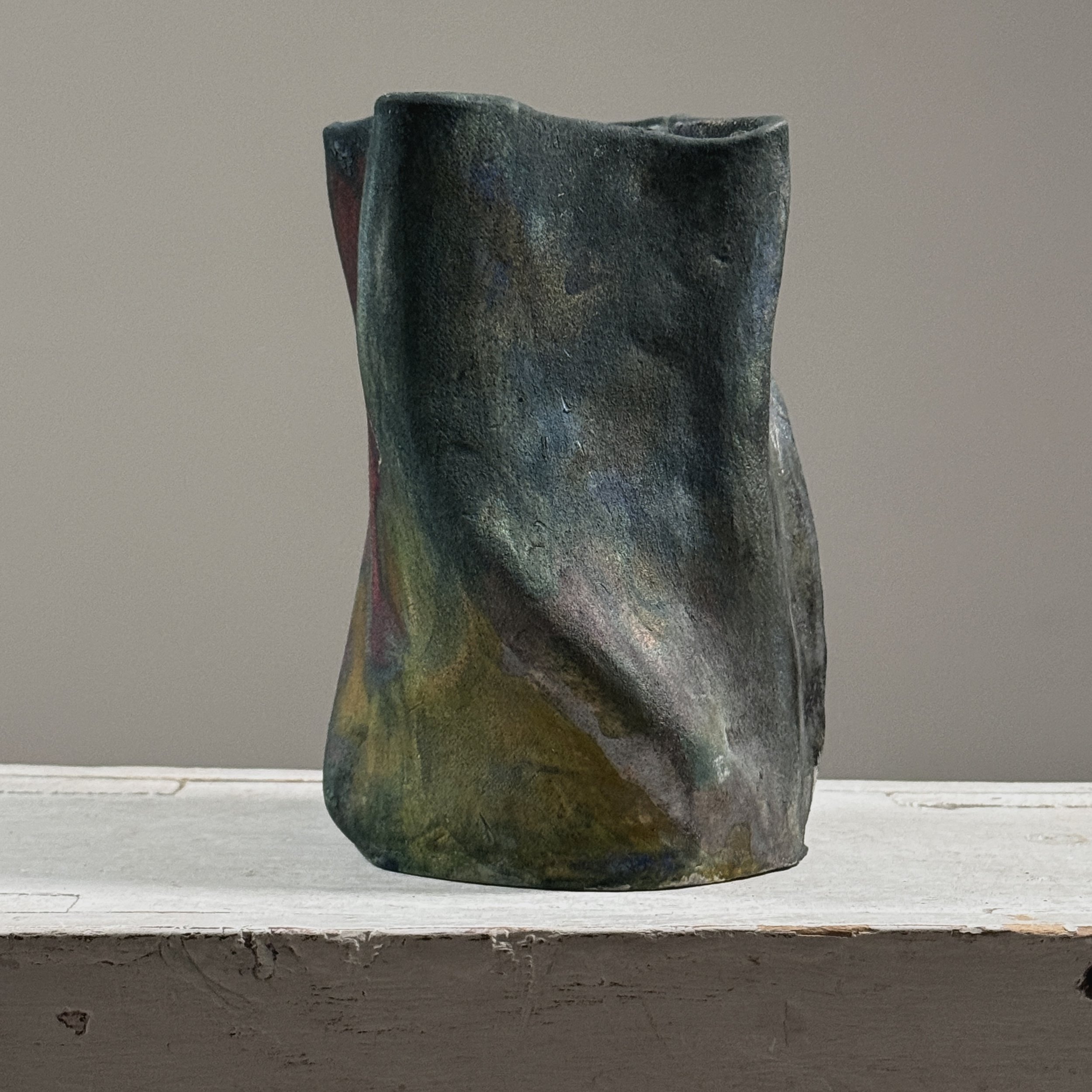 Vintage raku fired abstract fluid shaped blackware ceramic vessel, signed