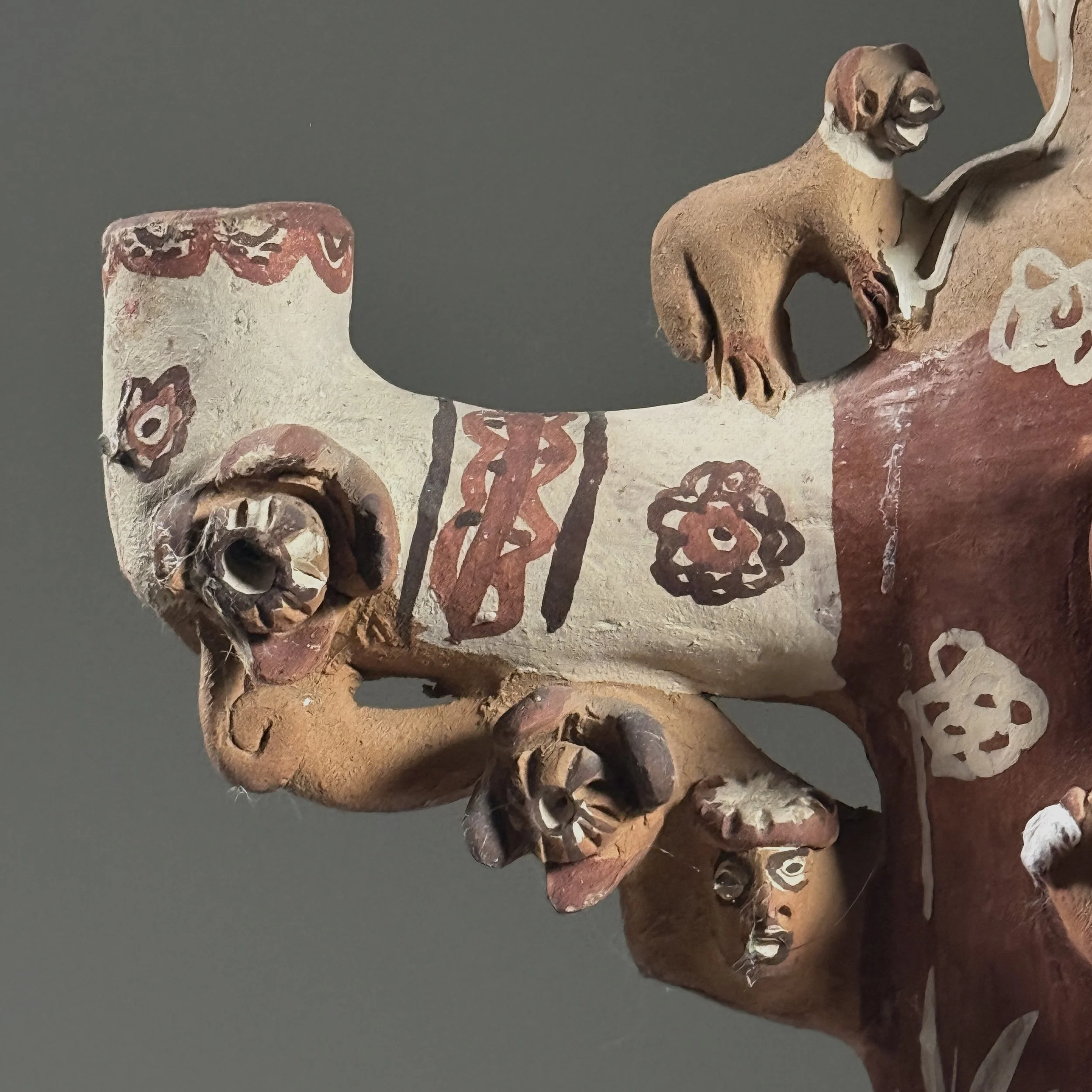 Macro detail of hand-painted polychrome decoration and ceramic construction techniques