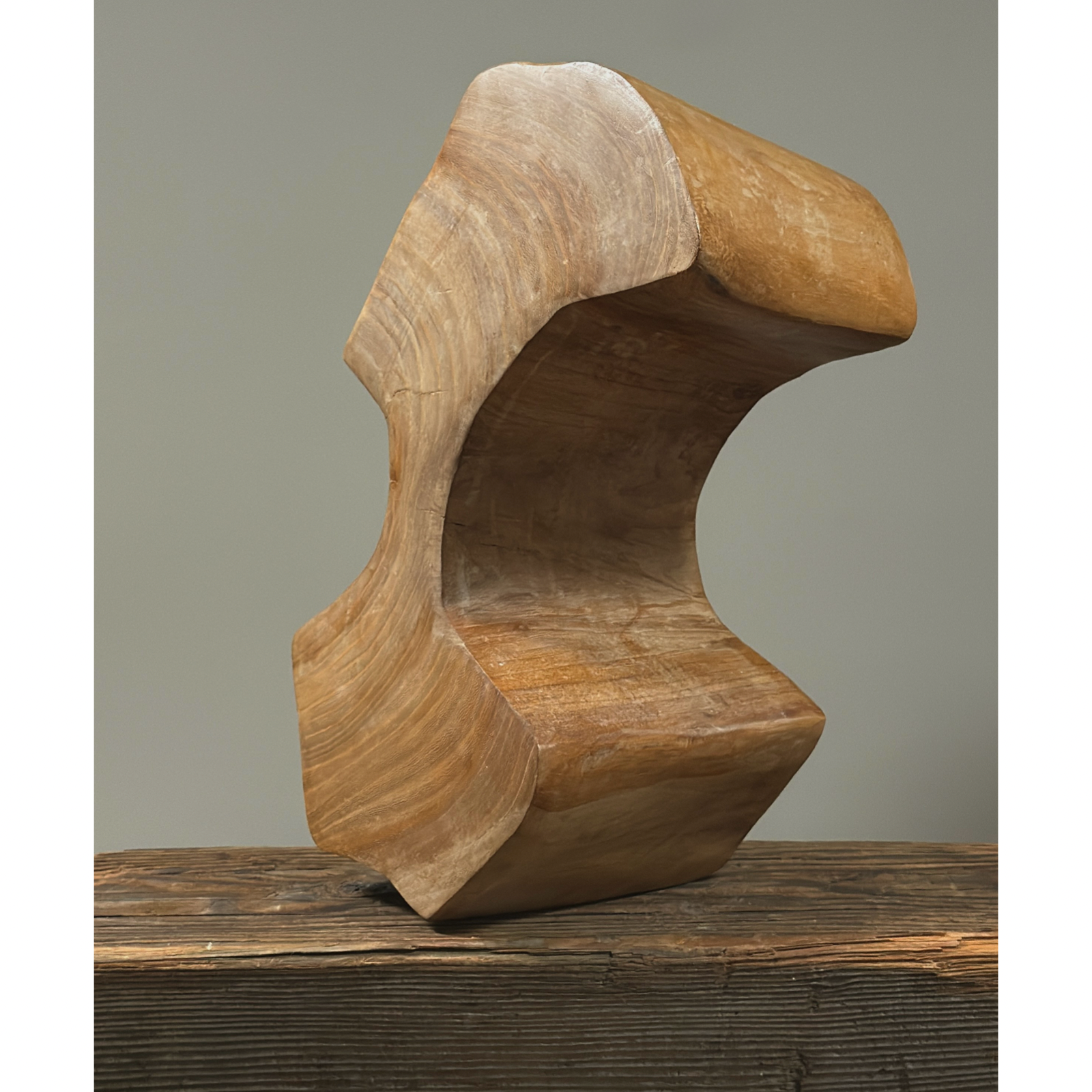 Three-quarter view of vintage hand carved Danish cubist sculpture, portrait form, wood, geometric carving