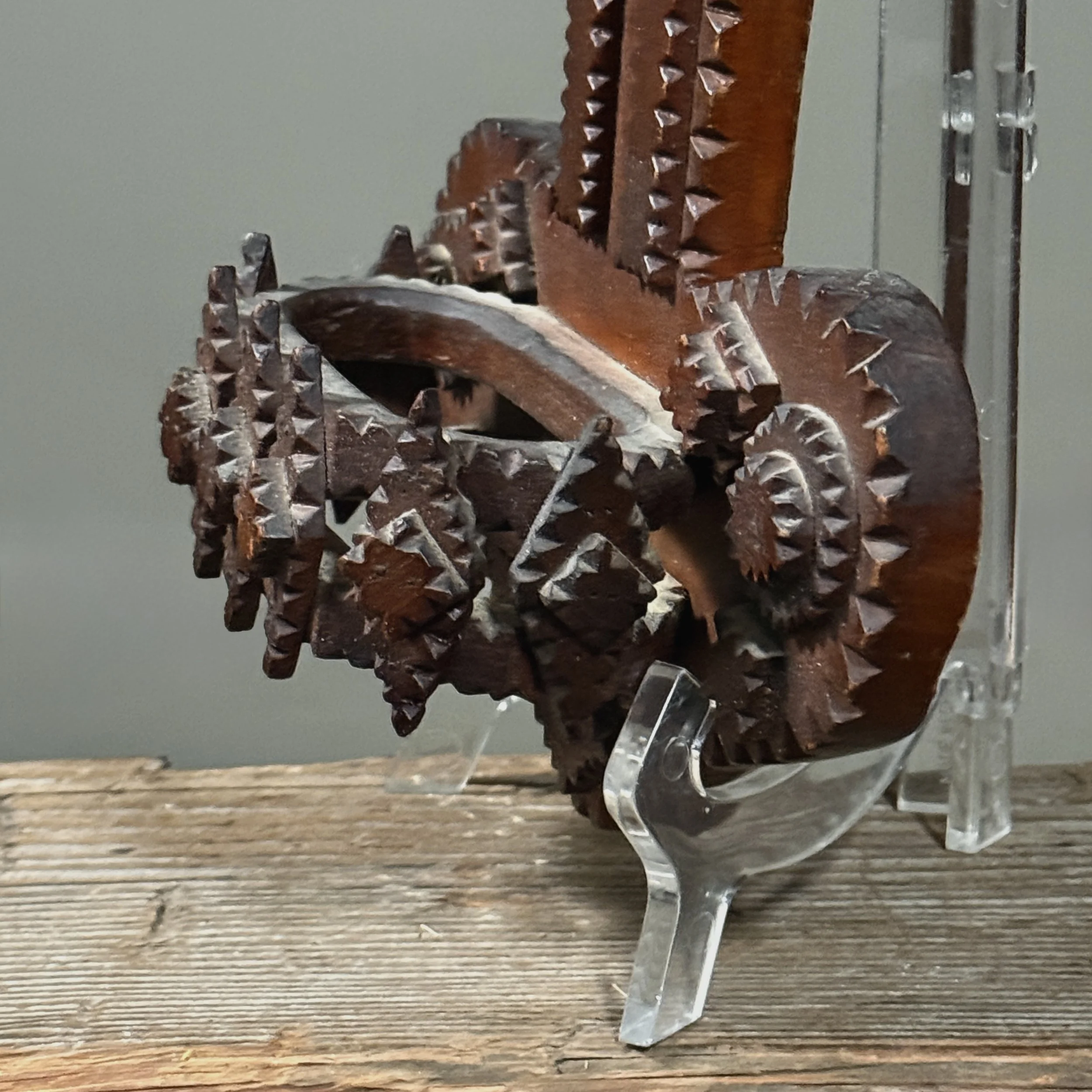 Aged patina on antique Tramp Art carving