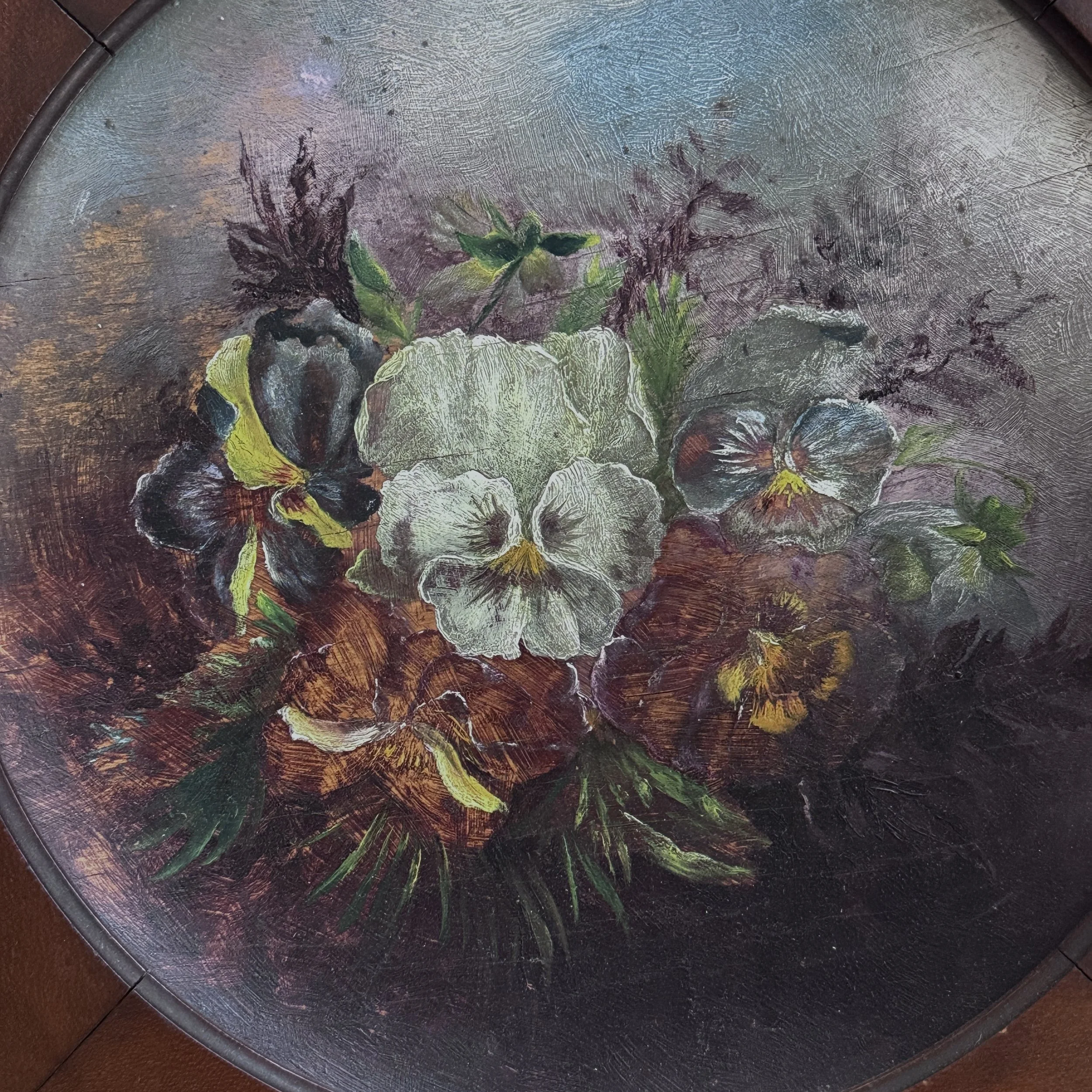 Antique 19th century French floral still life. Pansies. Oil on concave board. 13 by 13 inches.