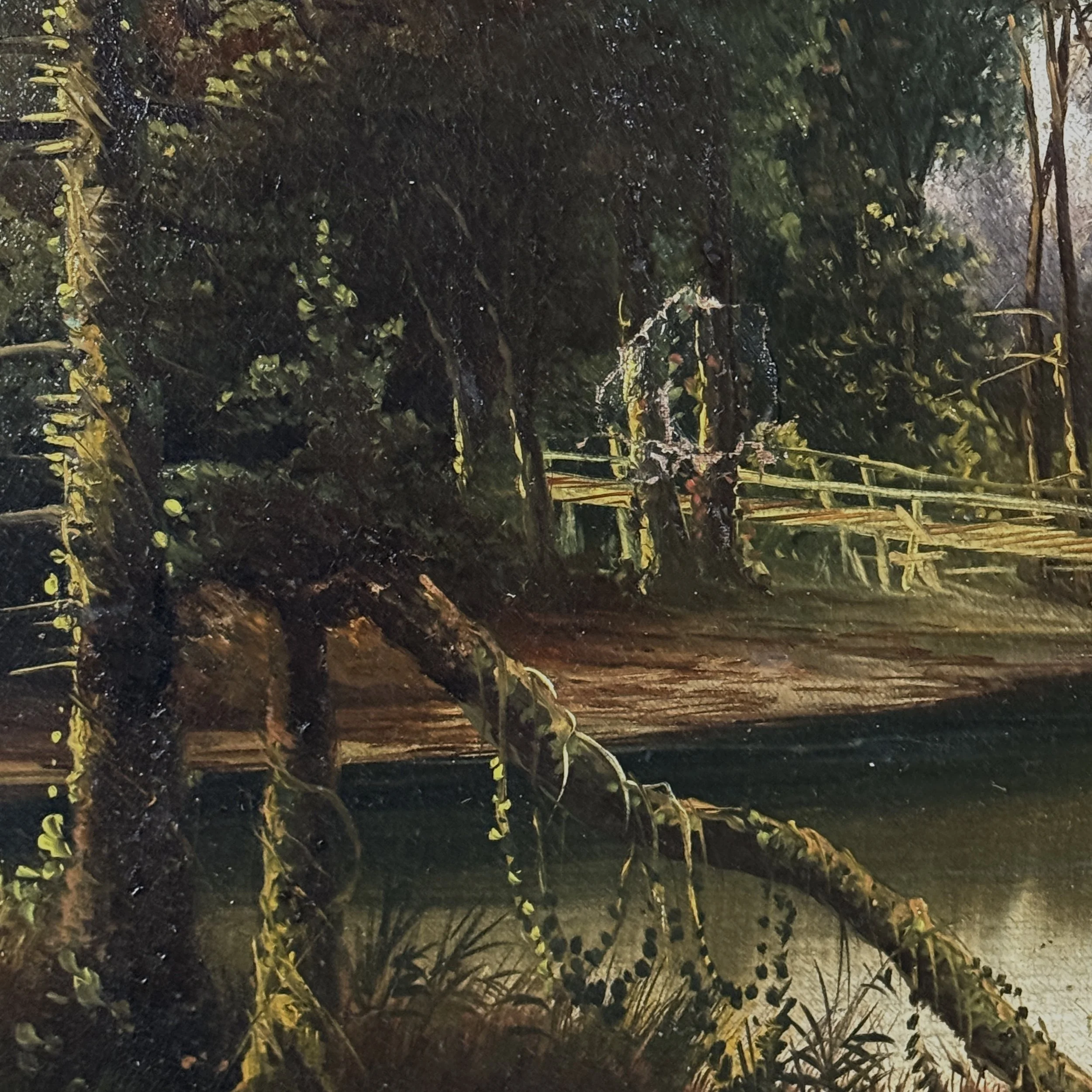 The left quadrant of the canvas showing the approximately one-inch area of damage