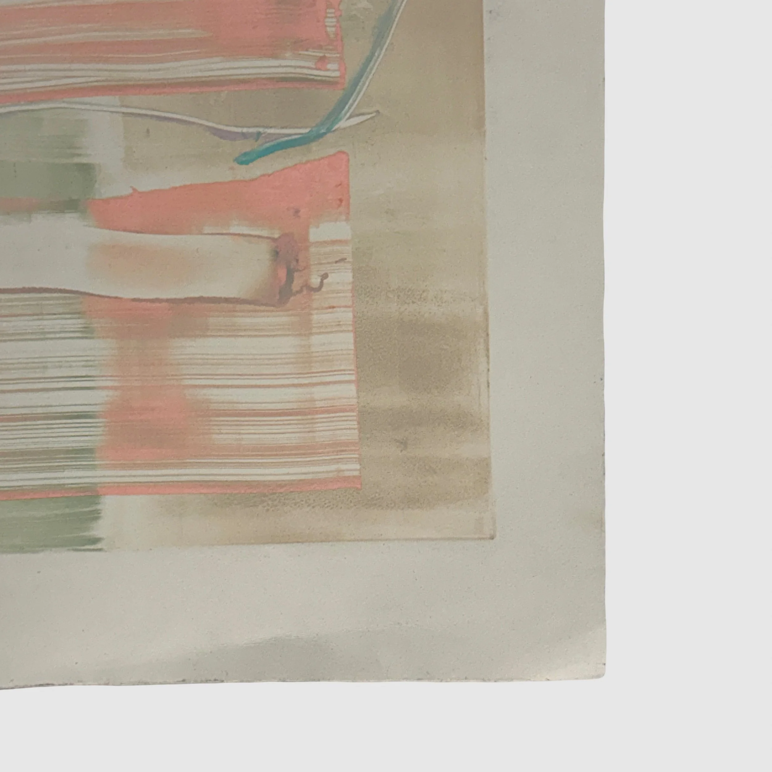 Deckled edge detail. Handmade grey paper. Irregular untrimmed edge.