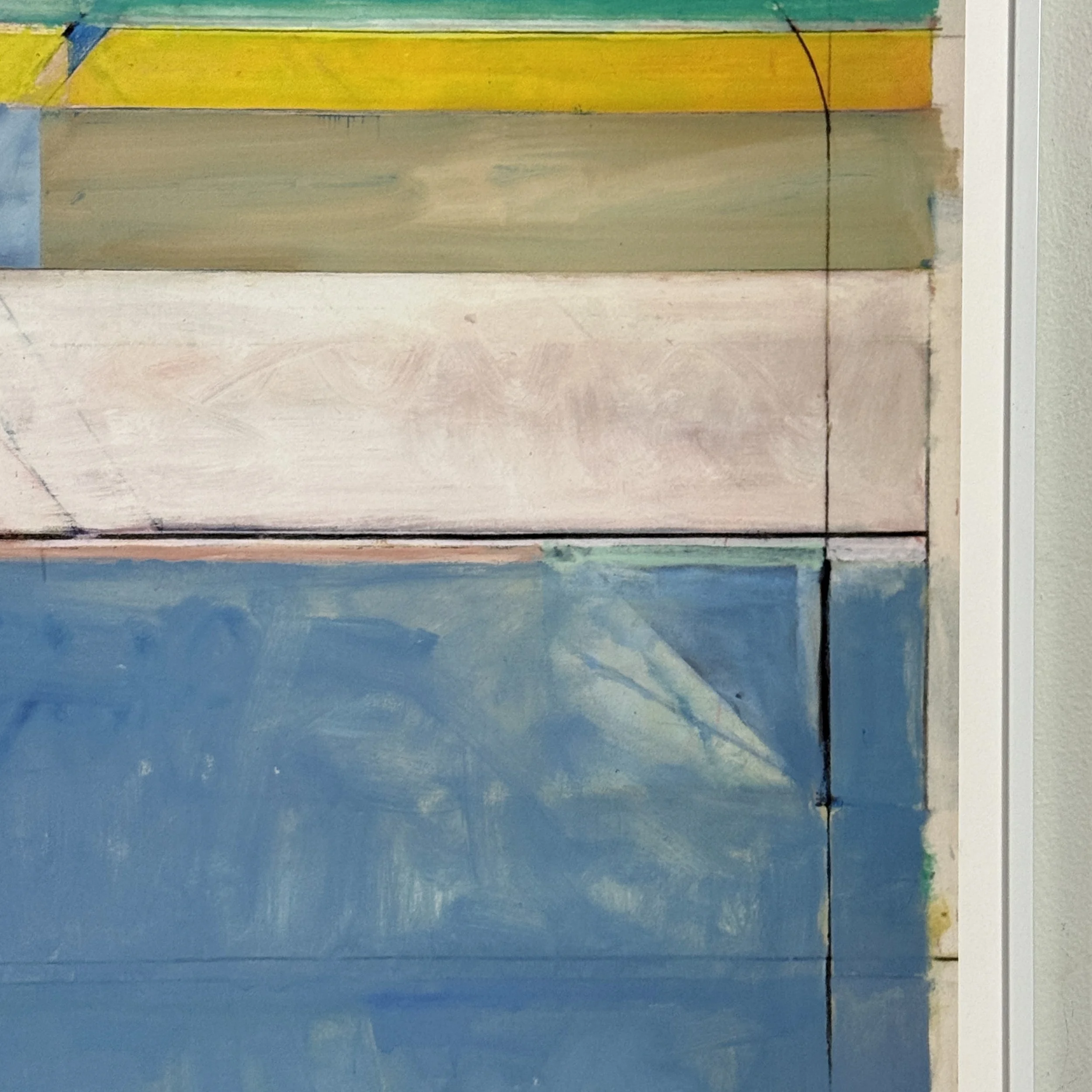 Macro detail showing the edge of the printed image meeting the white border of the paper support.