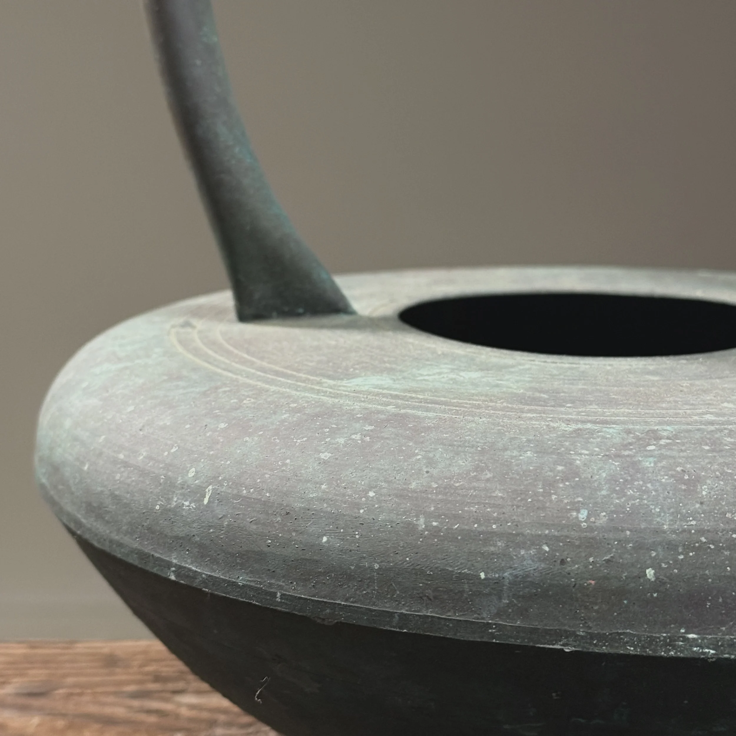 Close-up of verdigris finish. Green copper patina. Aged surface.