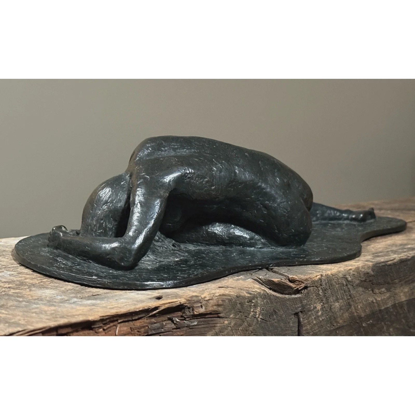 Three-quarter angle bronze nude figure in Rodin-like expressionist form