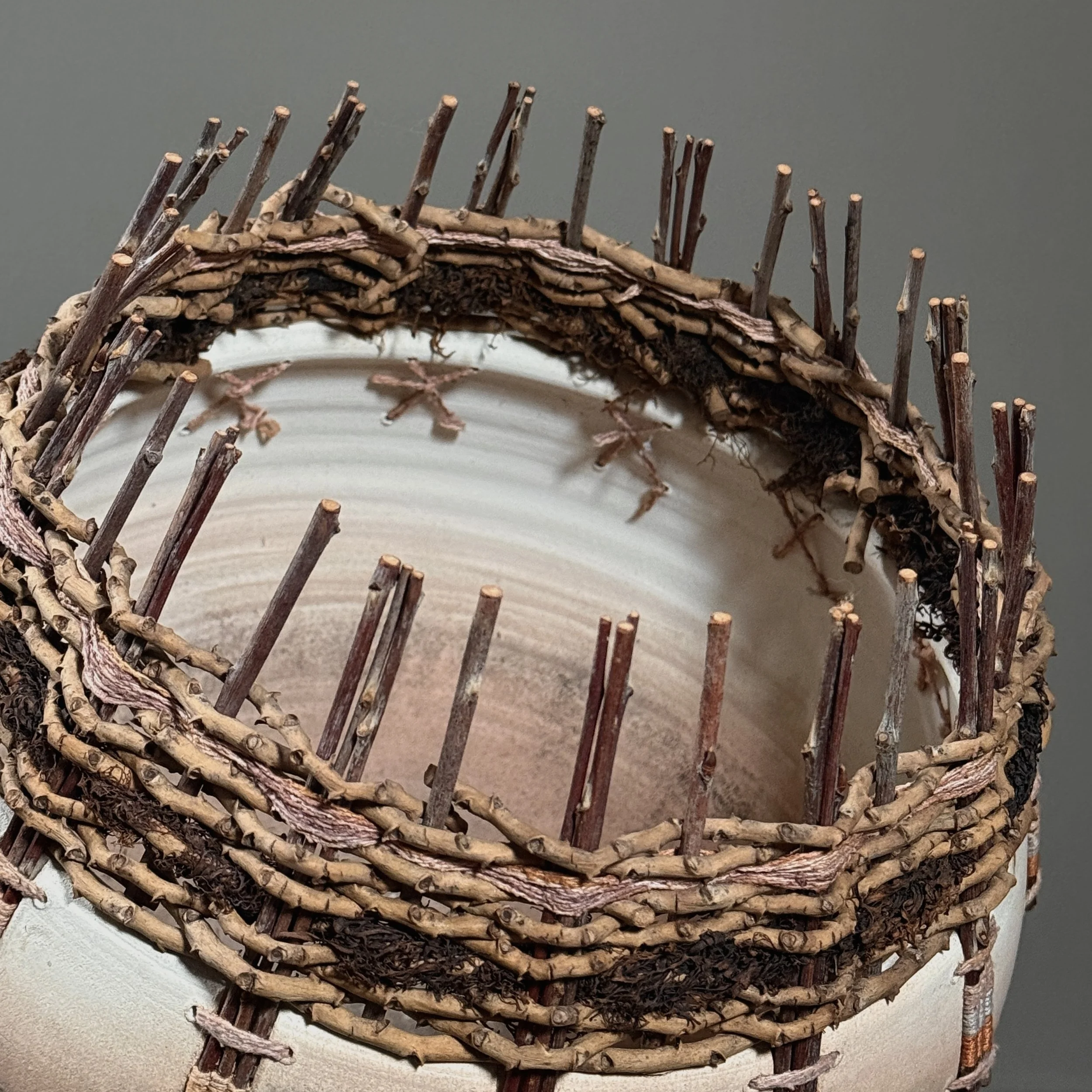 Handwoven rim detail raku ceramic vessel