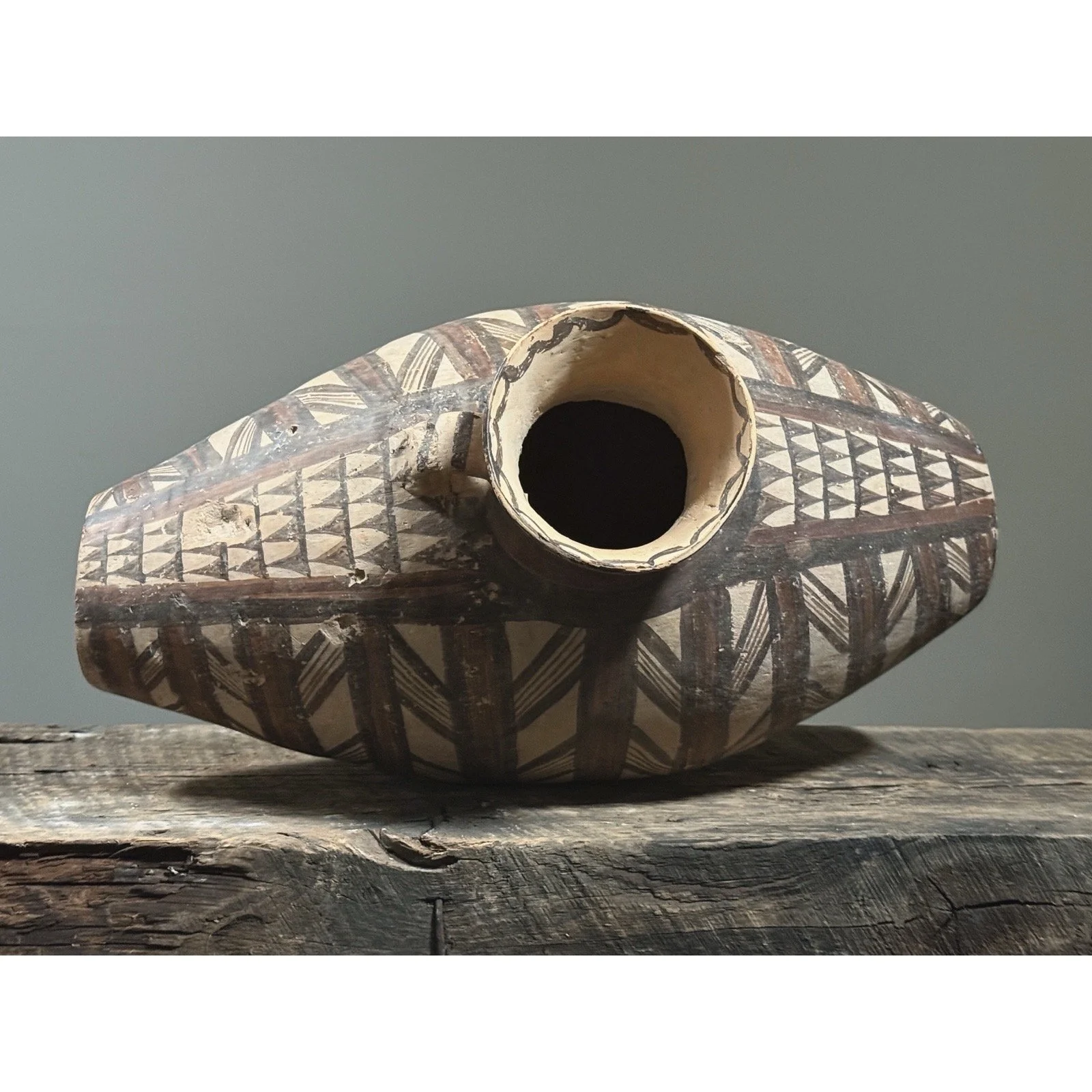 Top view showing small flared mouth and rim details