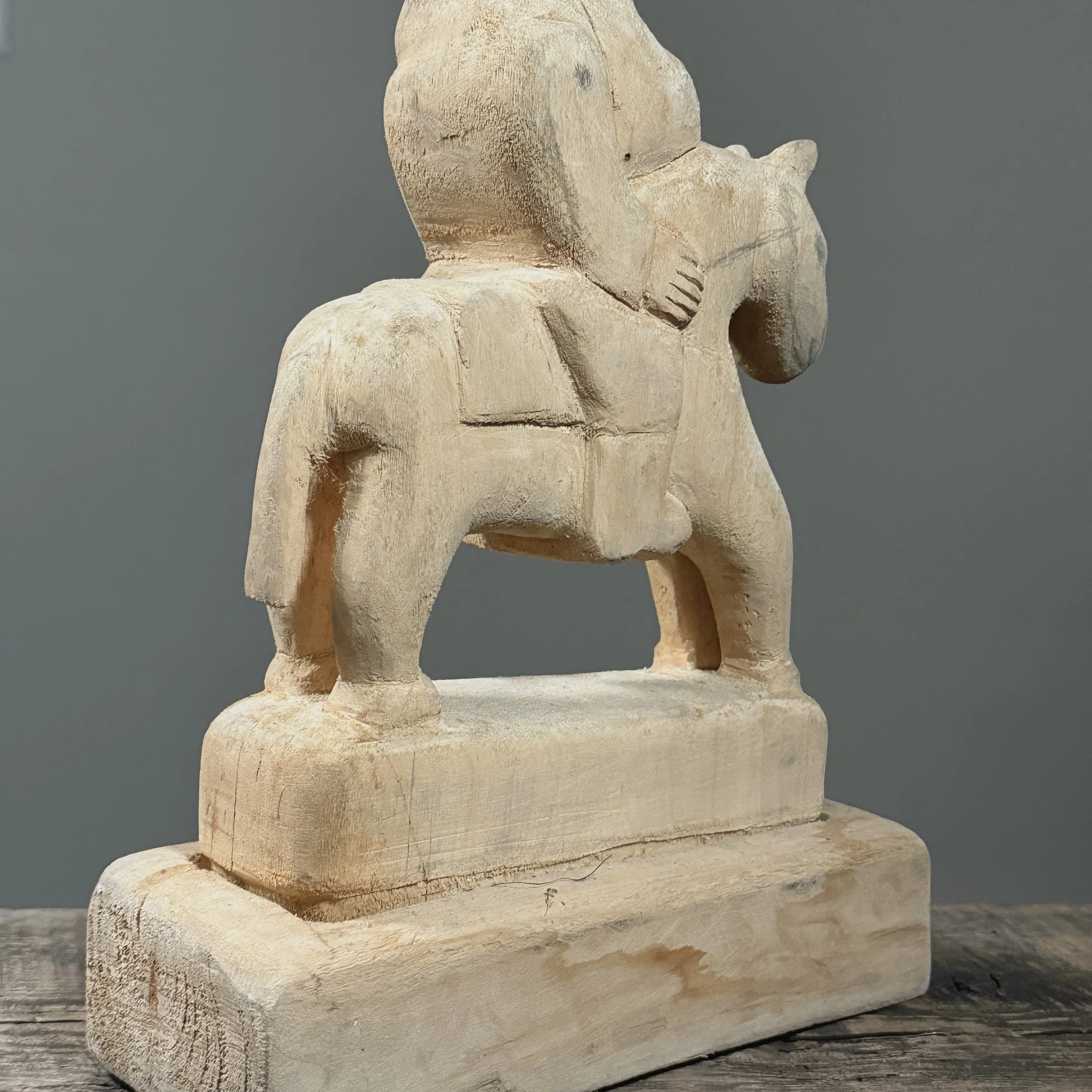 Angle emphasizing the simplified, bold forms of the horse.