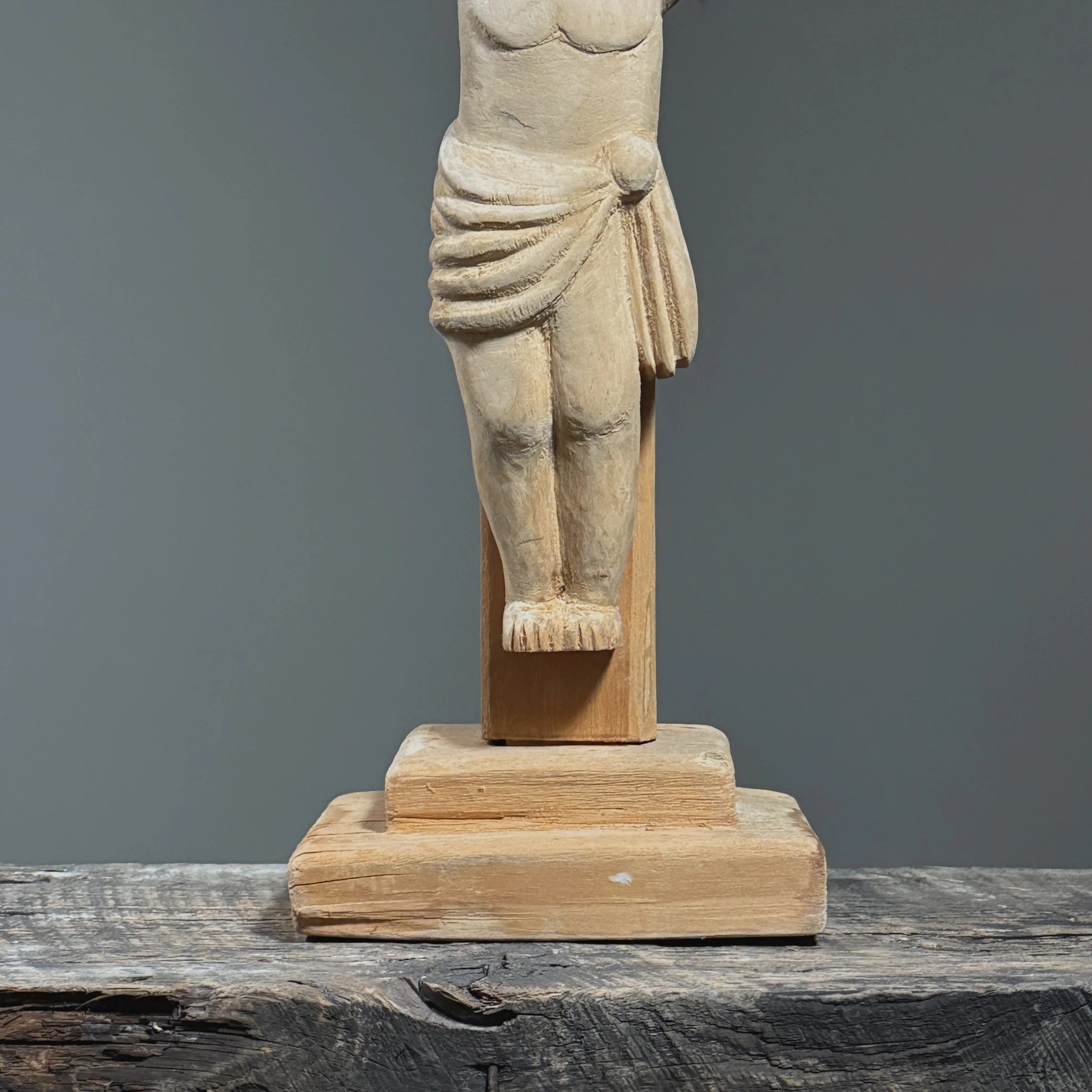 Detail of carved torso and drapery on folk art crucifix