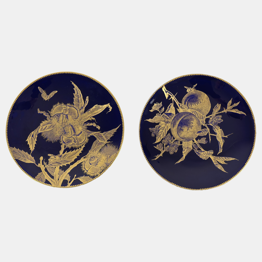 Pair of Brownfield English porcelain Aesthetic period plates, cobalt and gold, chestnut and peach motifs