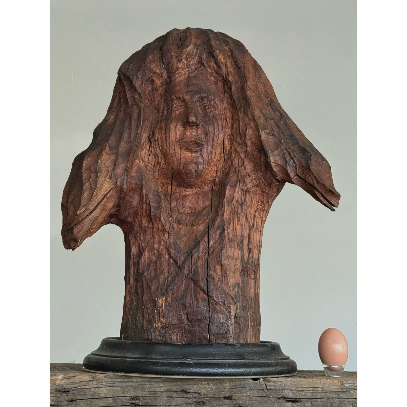 Vintage Outsider Art hand carved portrait in wood stump With egg for size reference