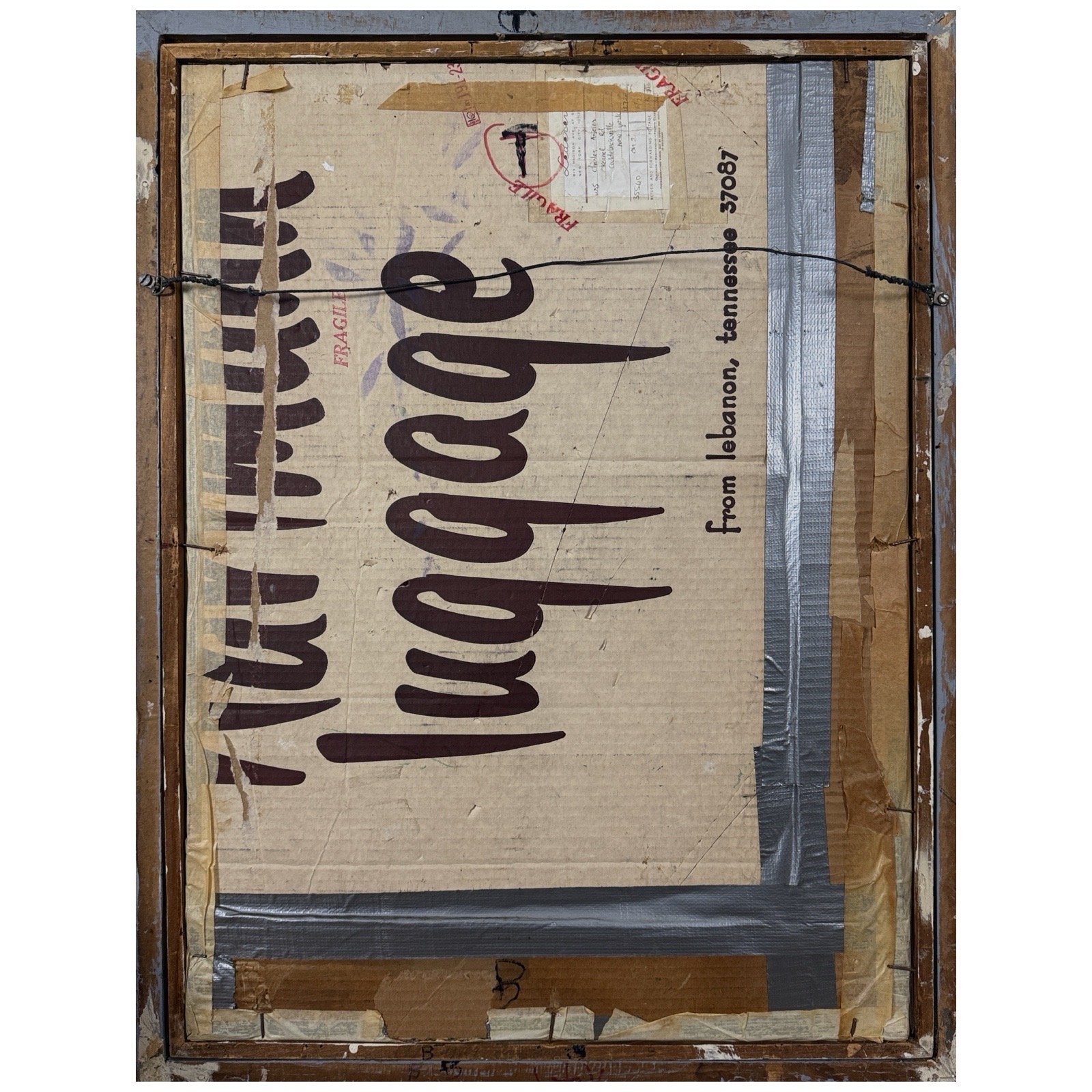 View of the painting's reverse and cardboard backing.