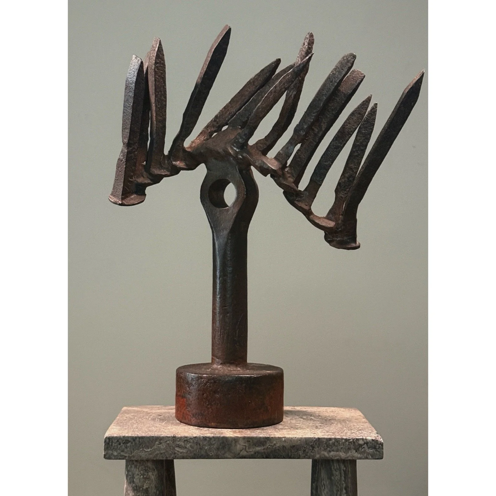 Vintage Brutalist abstract forged iron sculpture on white background. 17.5 inches tall.