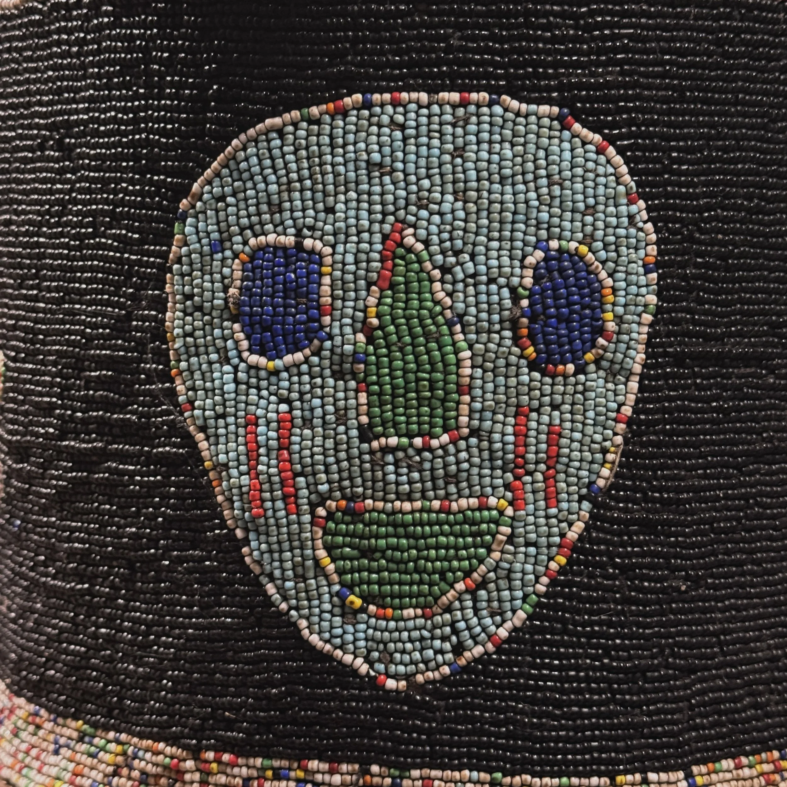 Detail of the skull motif positioned on the front of a Yoruba ceremonial headdress