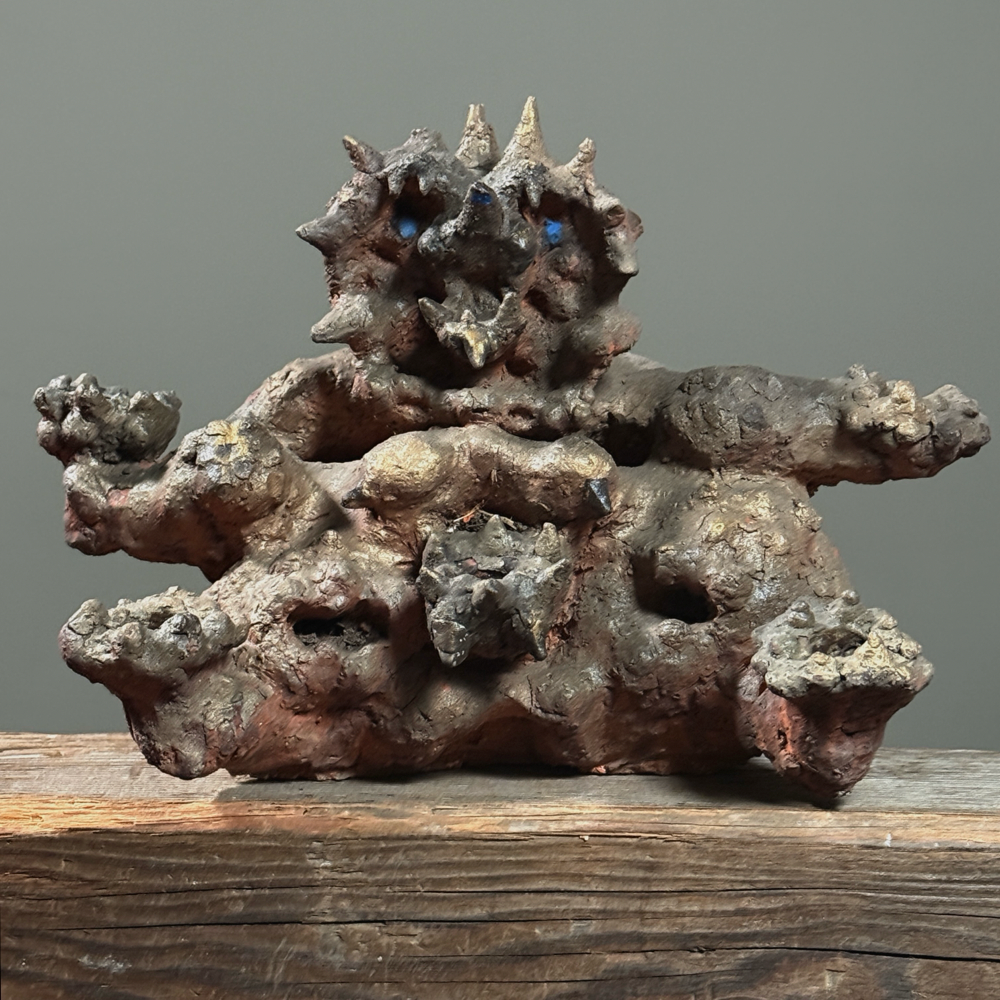Raymond Rocklin brutalist abstract demon stoneware candelabra. 13.18 inches wide by 9.75 inches high by 9.5 inches deep.