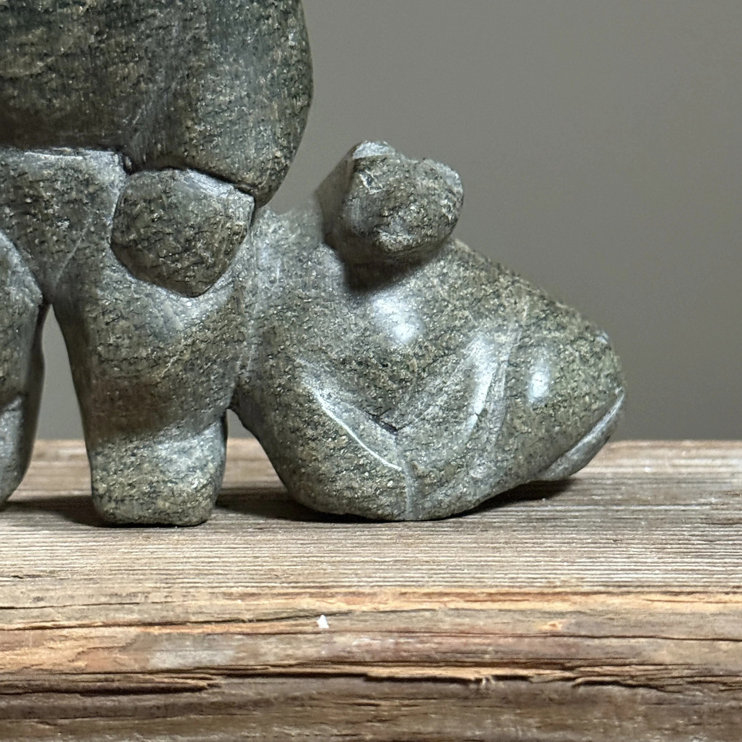 Macro detail of soapstone surface showing natural veining and age-appropriate wear
