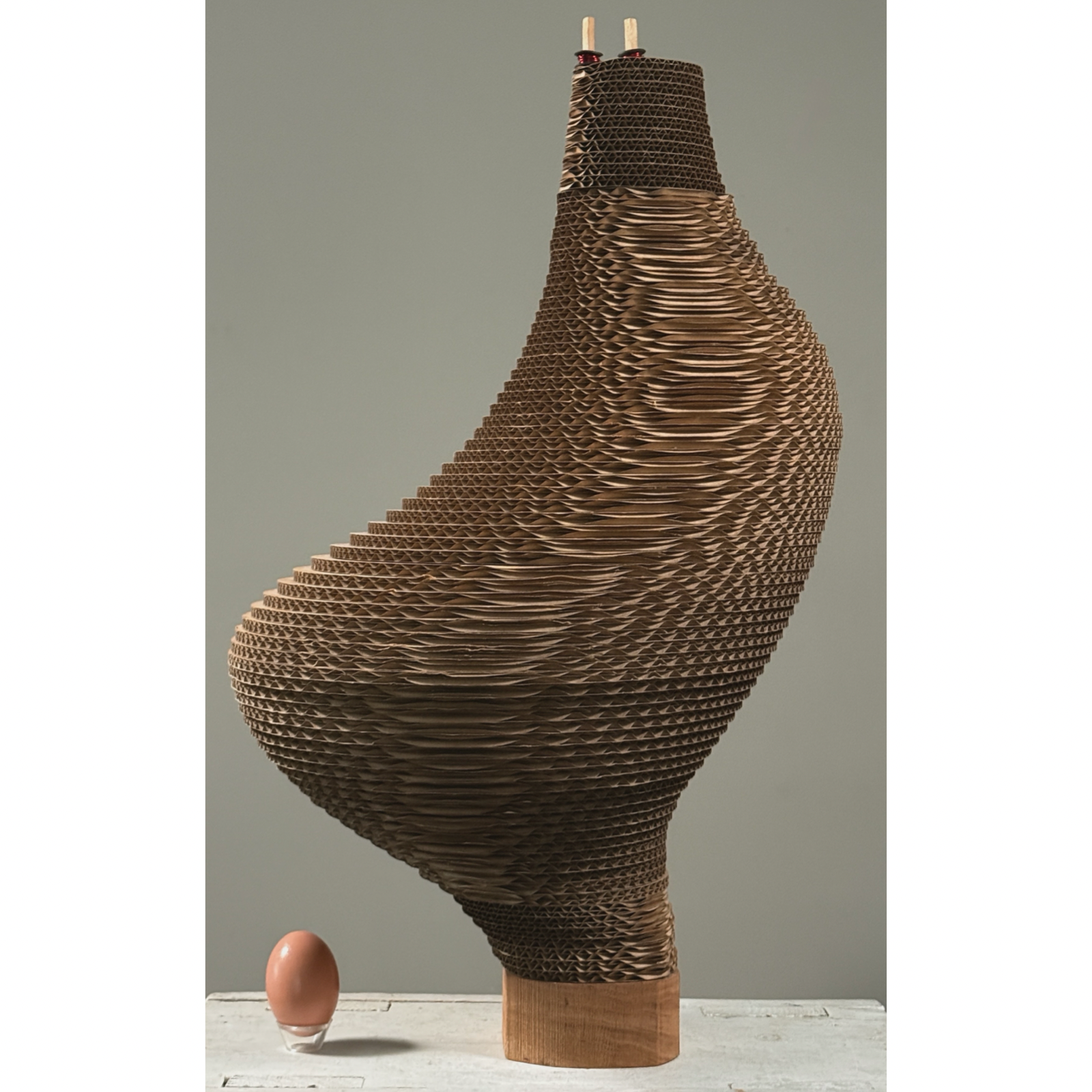 Vintage biomorphic postmodernist corrugated cardboard sculpture on carved wood base