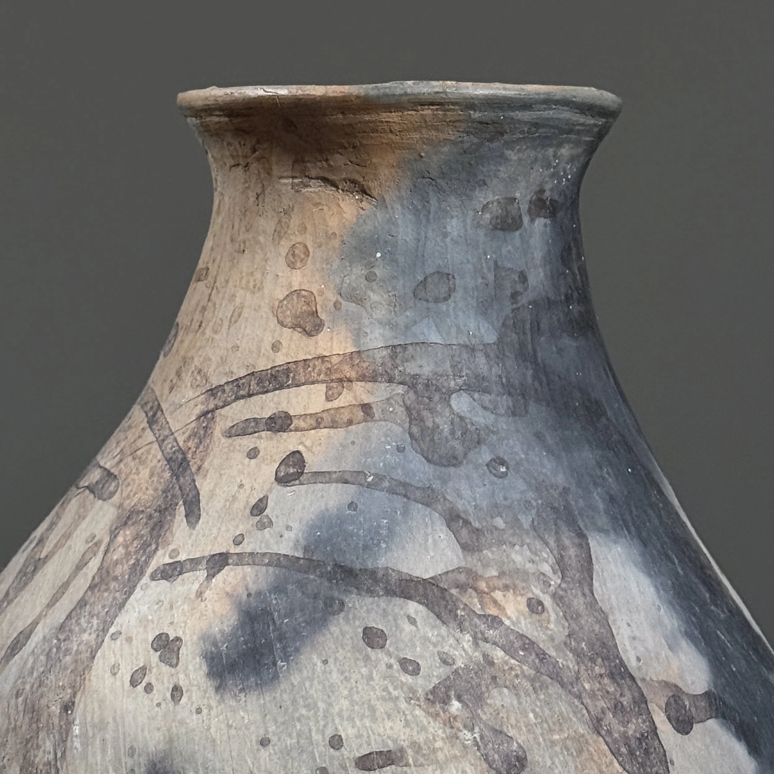 Close-up of mottled plant-based tannin finish on Tonaltepec clay
