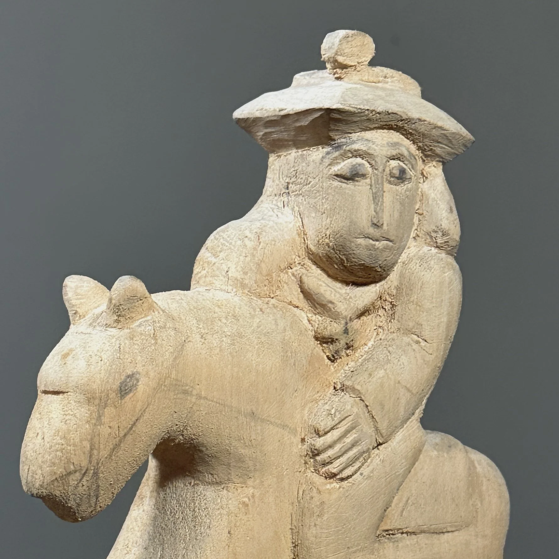 Detail of the expressive, stylized horse's head and neck.