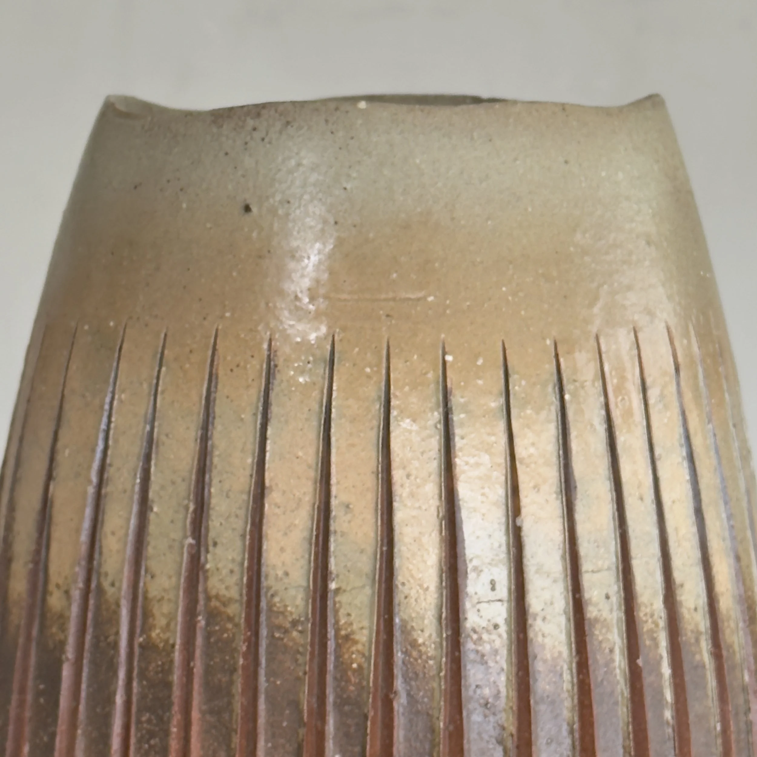 Wood fired surface detail, ash and flame effects, stoneware vessel