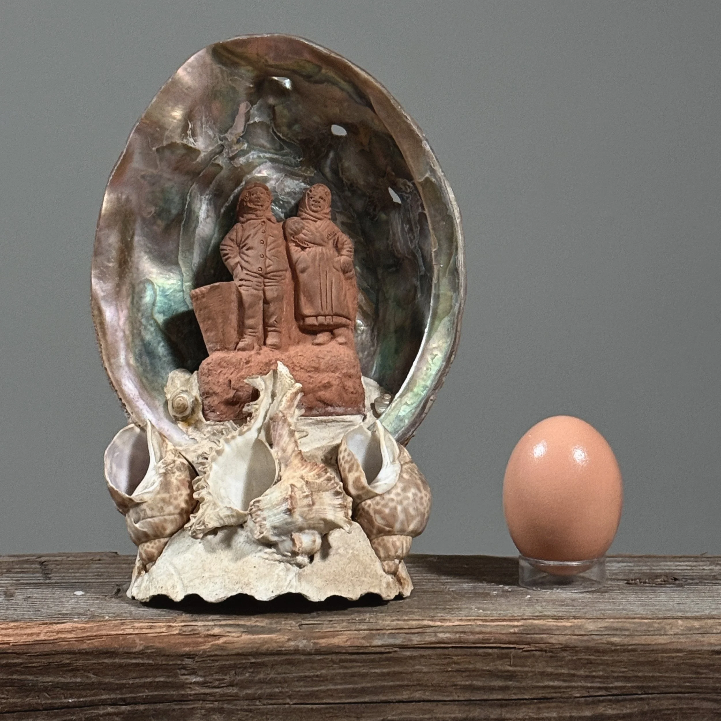 Attributed to Pierre-Adrien Graillon, French terracotta couple in abalone shell, Dieppe folk art