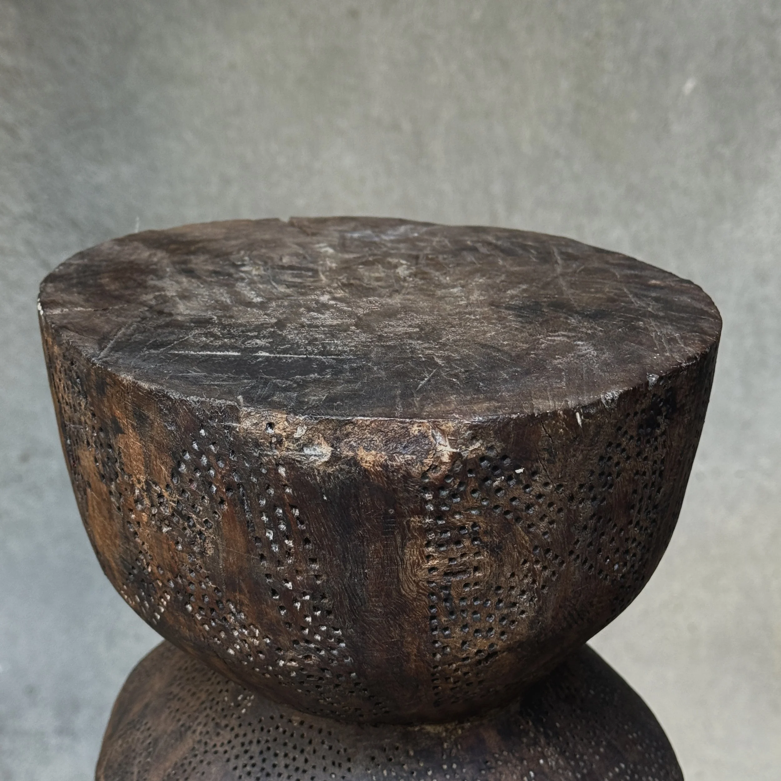 Textural stippled carving on vintage wood piece