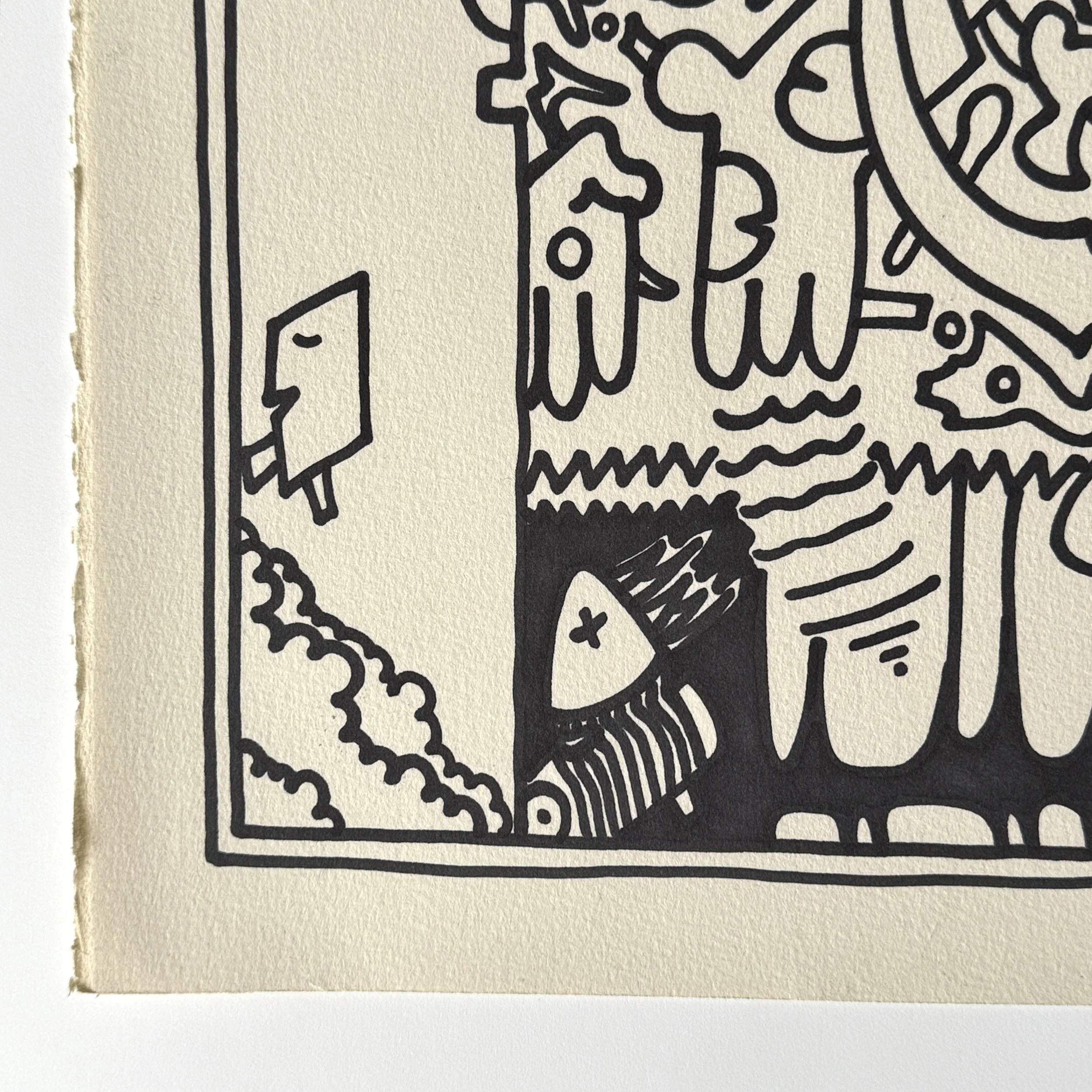 Close-up showing interlocking linear forms on cream background