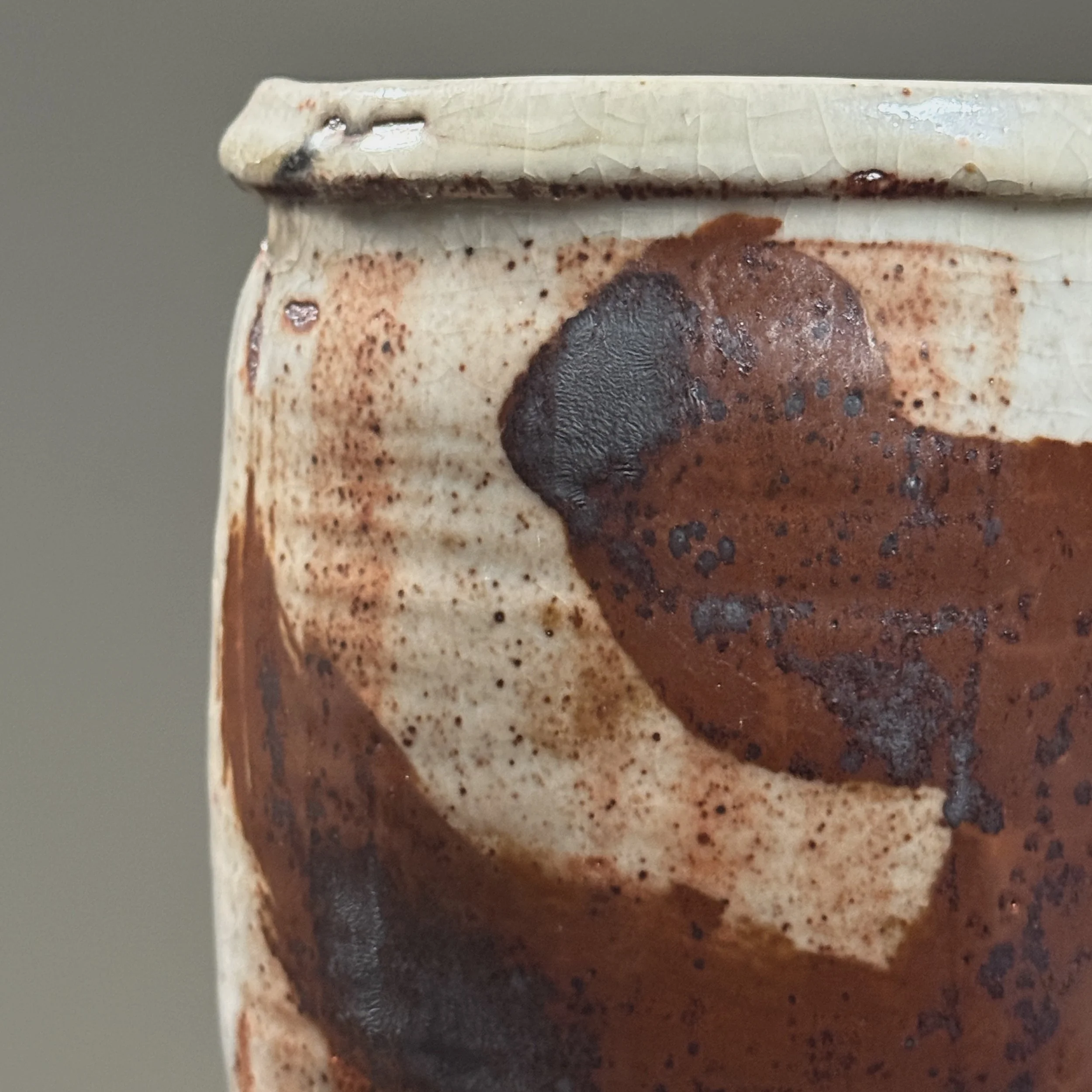 Close-up of Shino crackle glaze. Fine crackle pattern throughout surface.