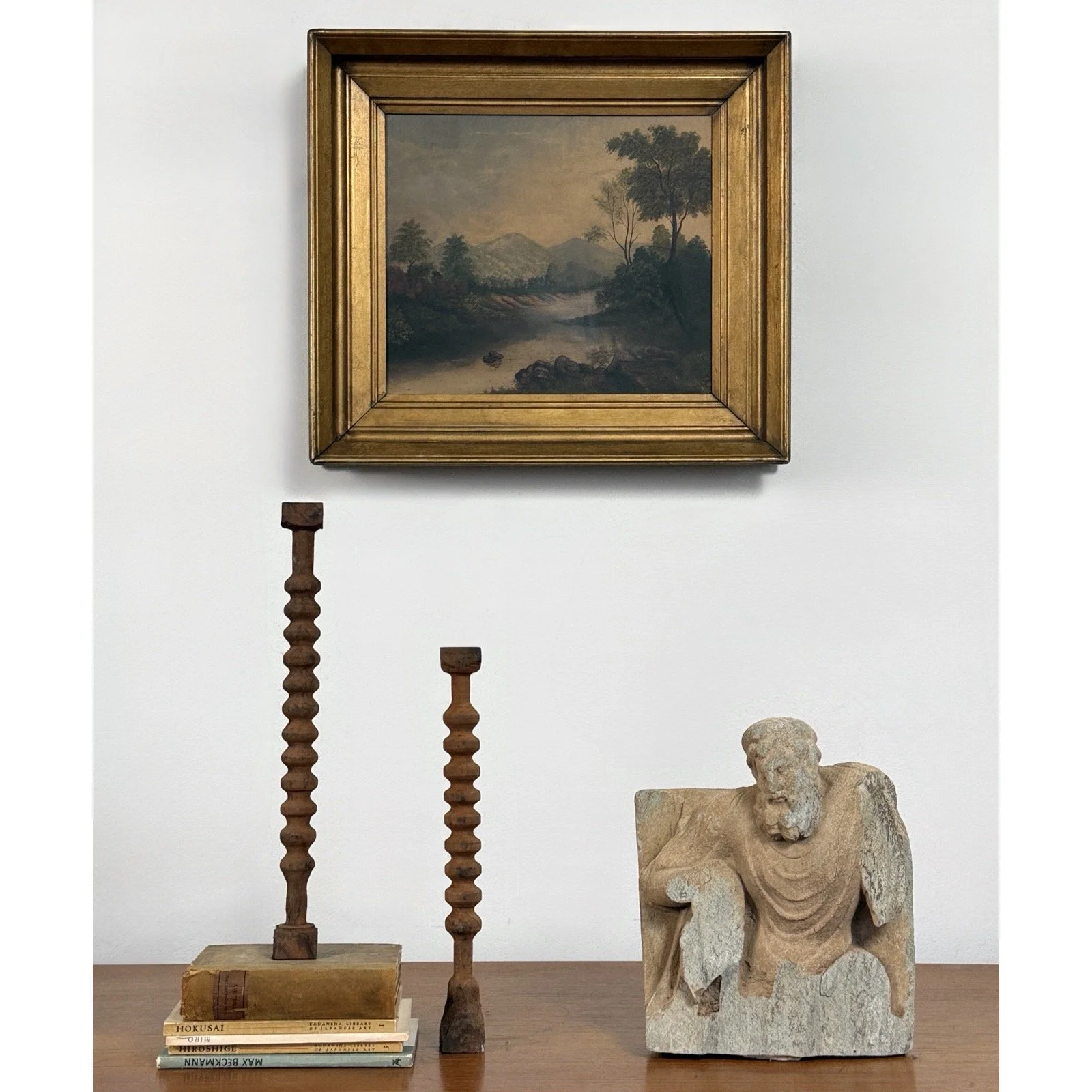 Hudson River School painting in a vignette.