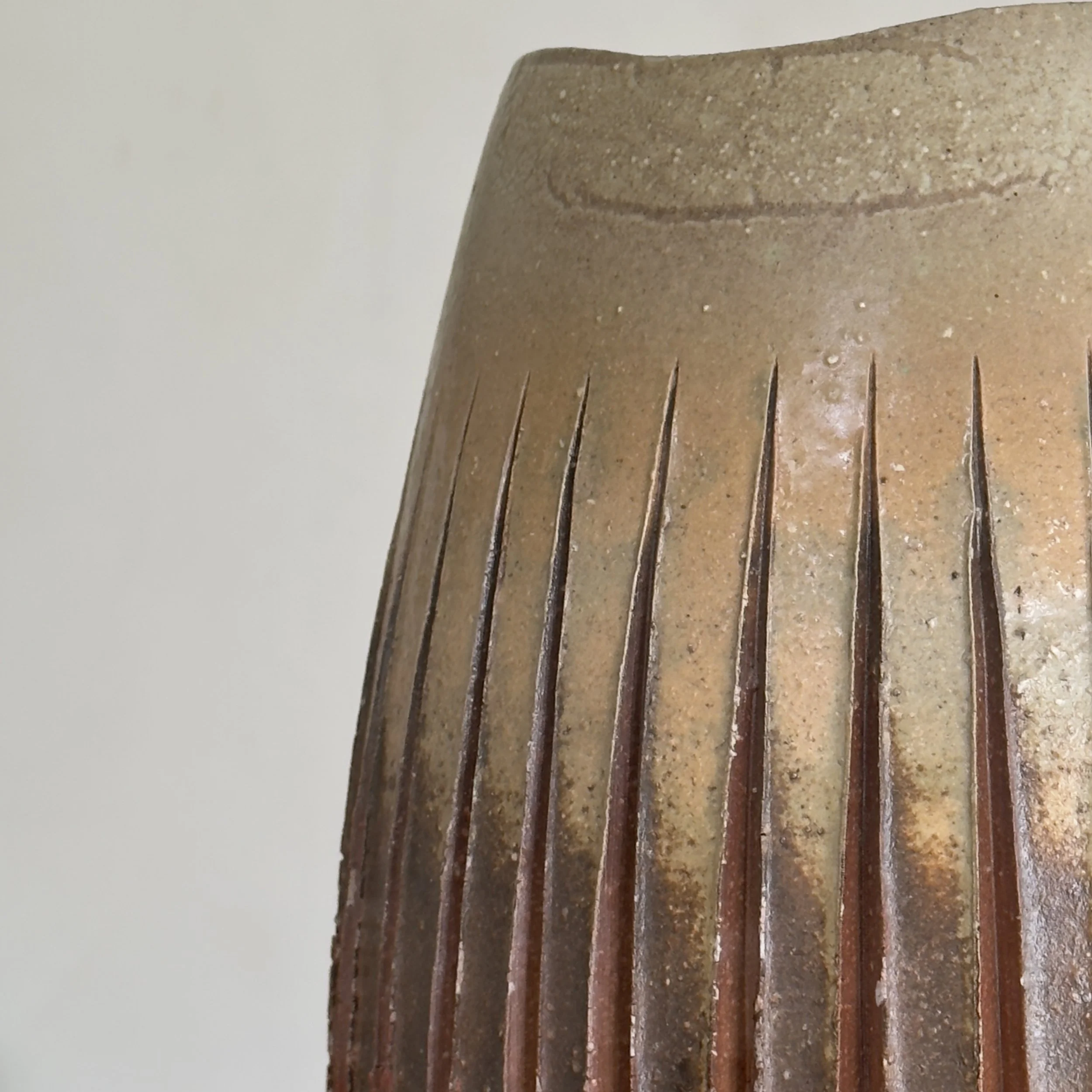 Wood fired surface detail, ash and flame effects, stoneware vessel