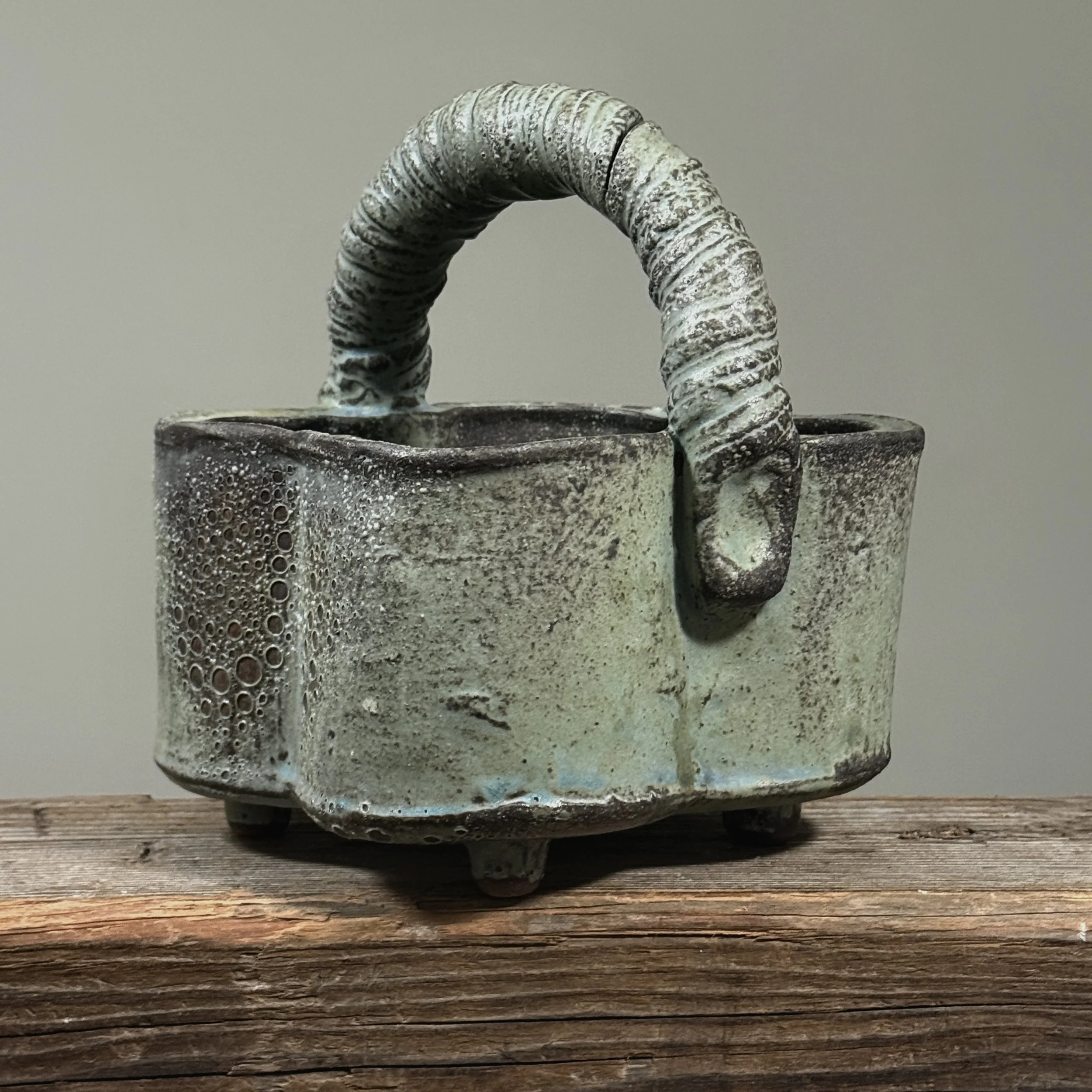 Seiko Kato Behr greenish-blue glazed stoneware vessel with hand-coiled handle