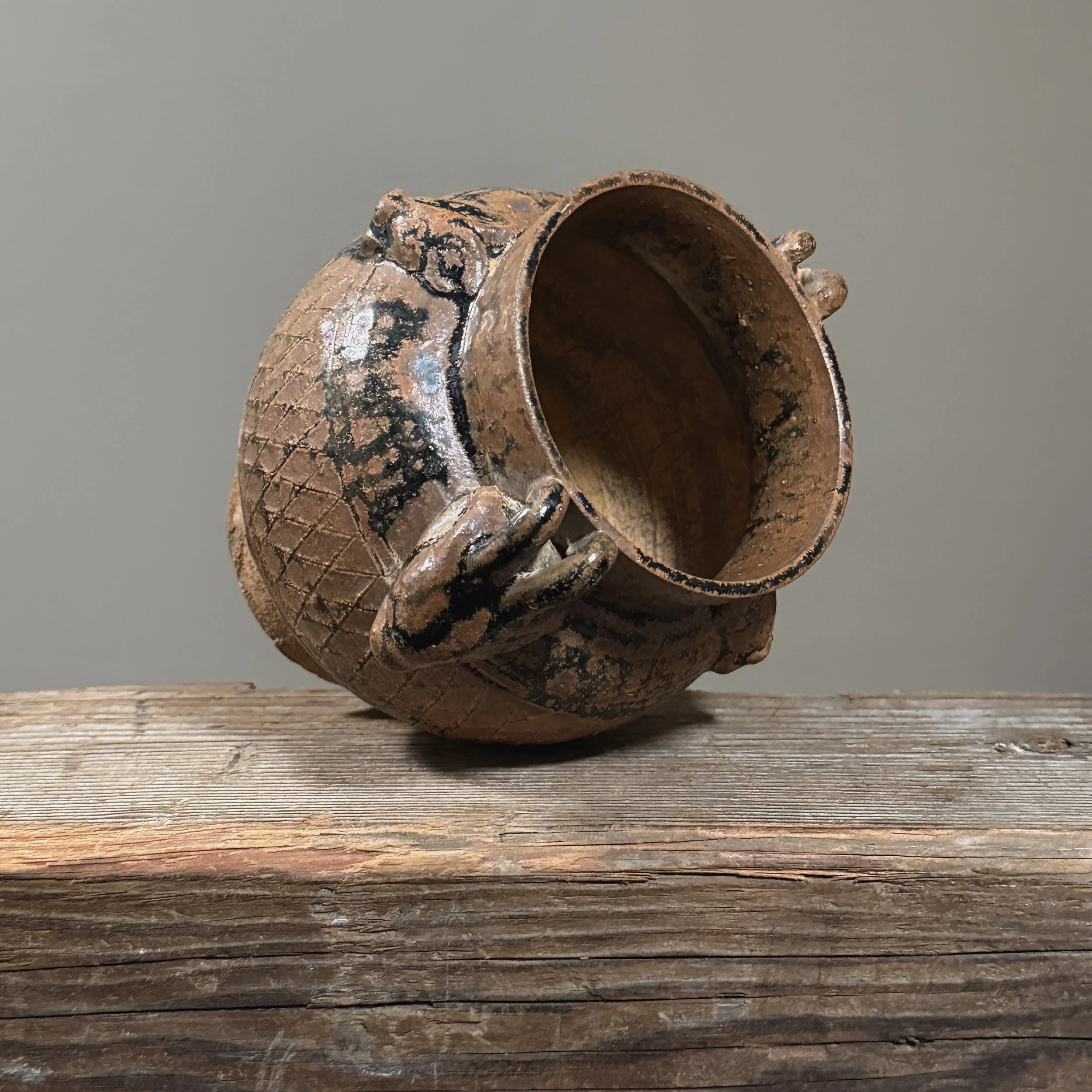 Overhead view looking into the jar's mouth, showing the flared lip and interior.