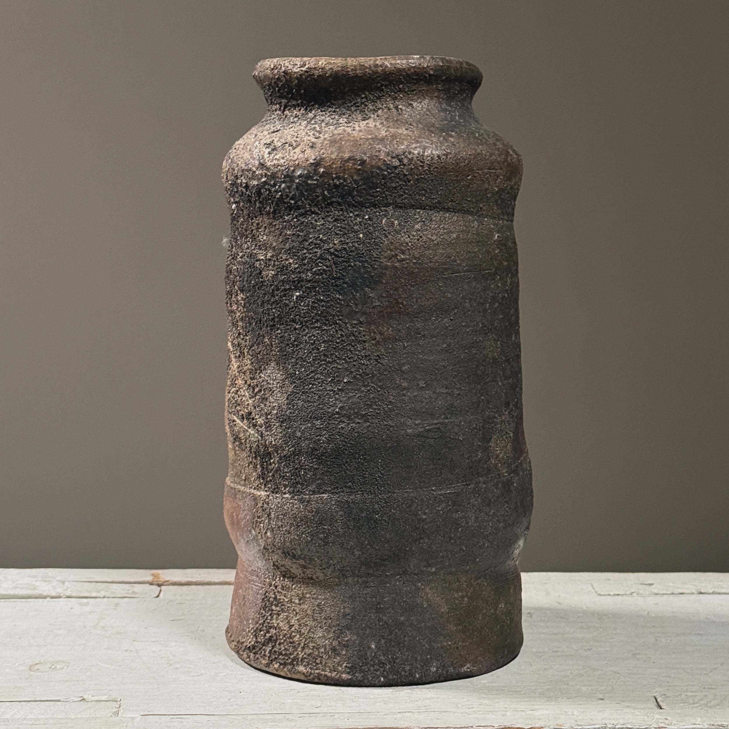 Vintage Japanese Bizen ware wood fired stoneware vessel. 9.25 inches height by 4.75 inches diameter.
